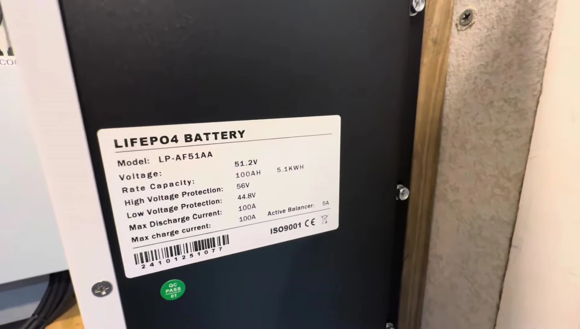 Close-up of the battery's model number and specifications
