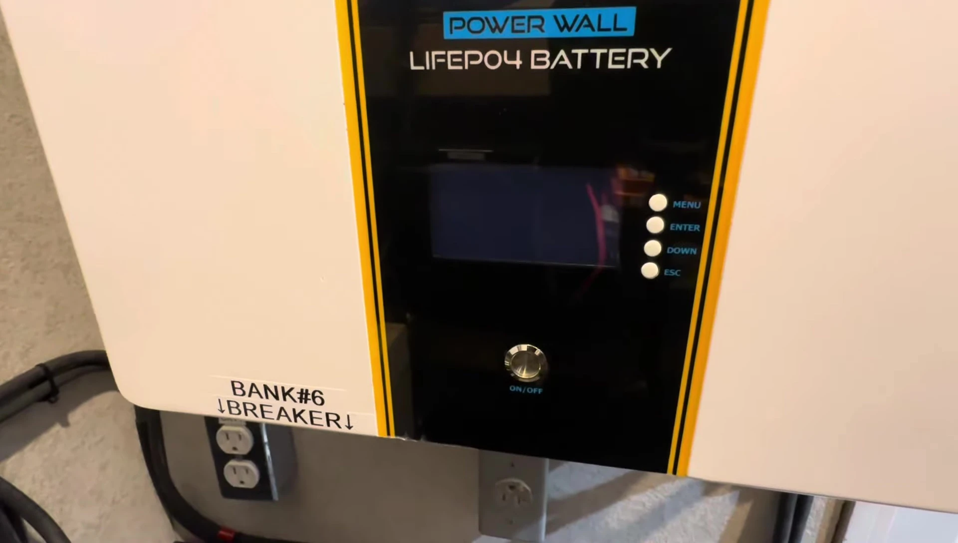 Front of the battery showing the display and on/off switch