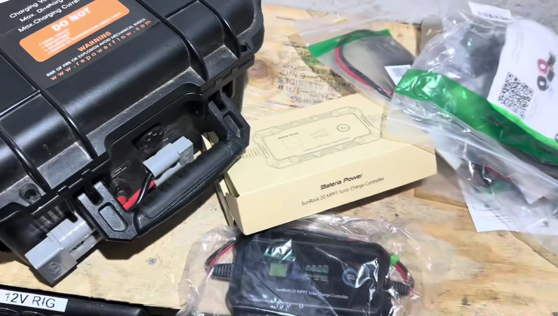 The setup for testing the charge controller with a 12V battery and solar panels.