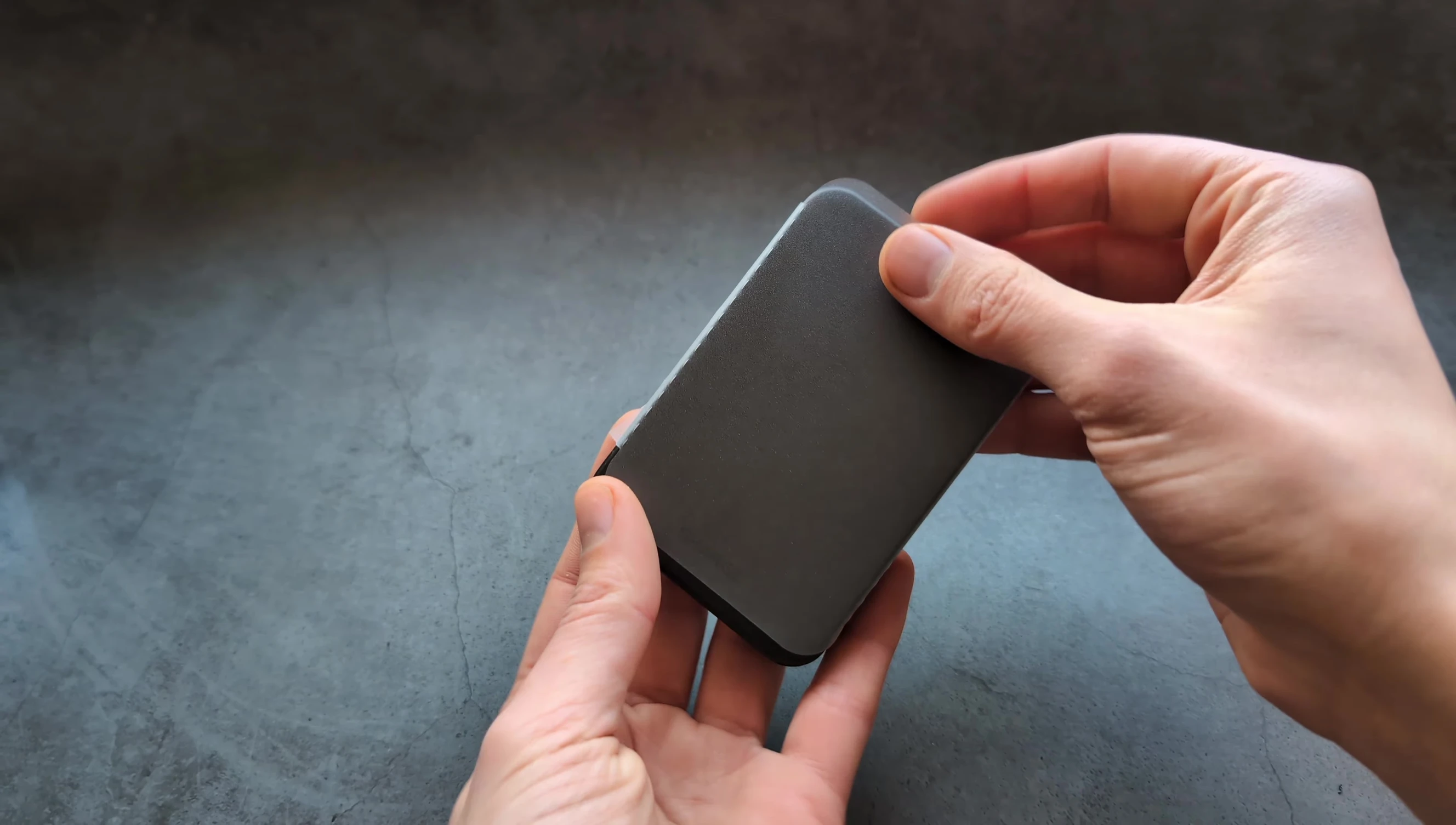 Power bank removed from protective sleeve