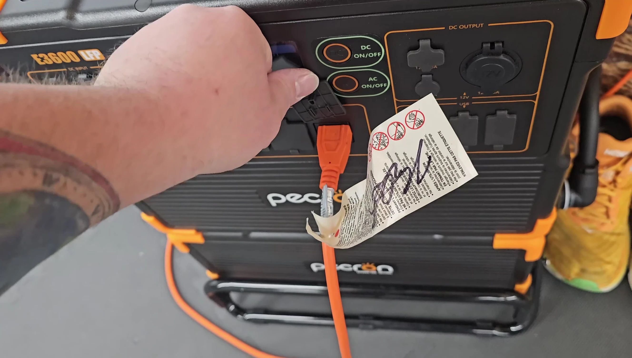 Various electronics connected to the power station inside the tent.