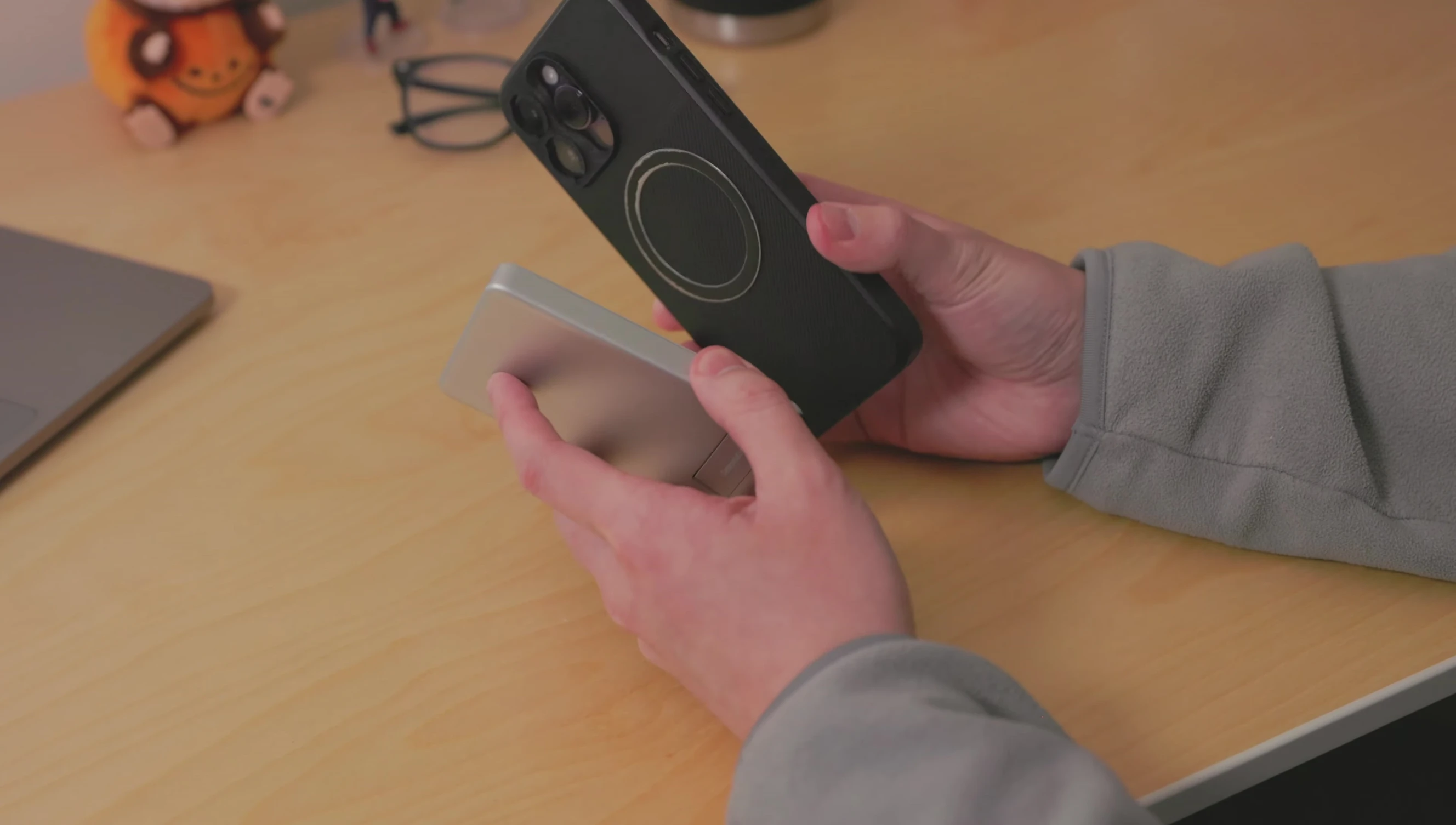 Size comparison of the INIU P73-E1 with an iPhone.