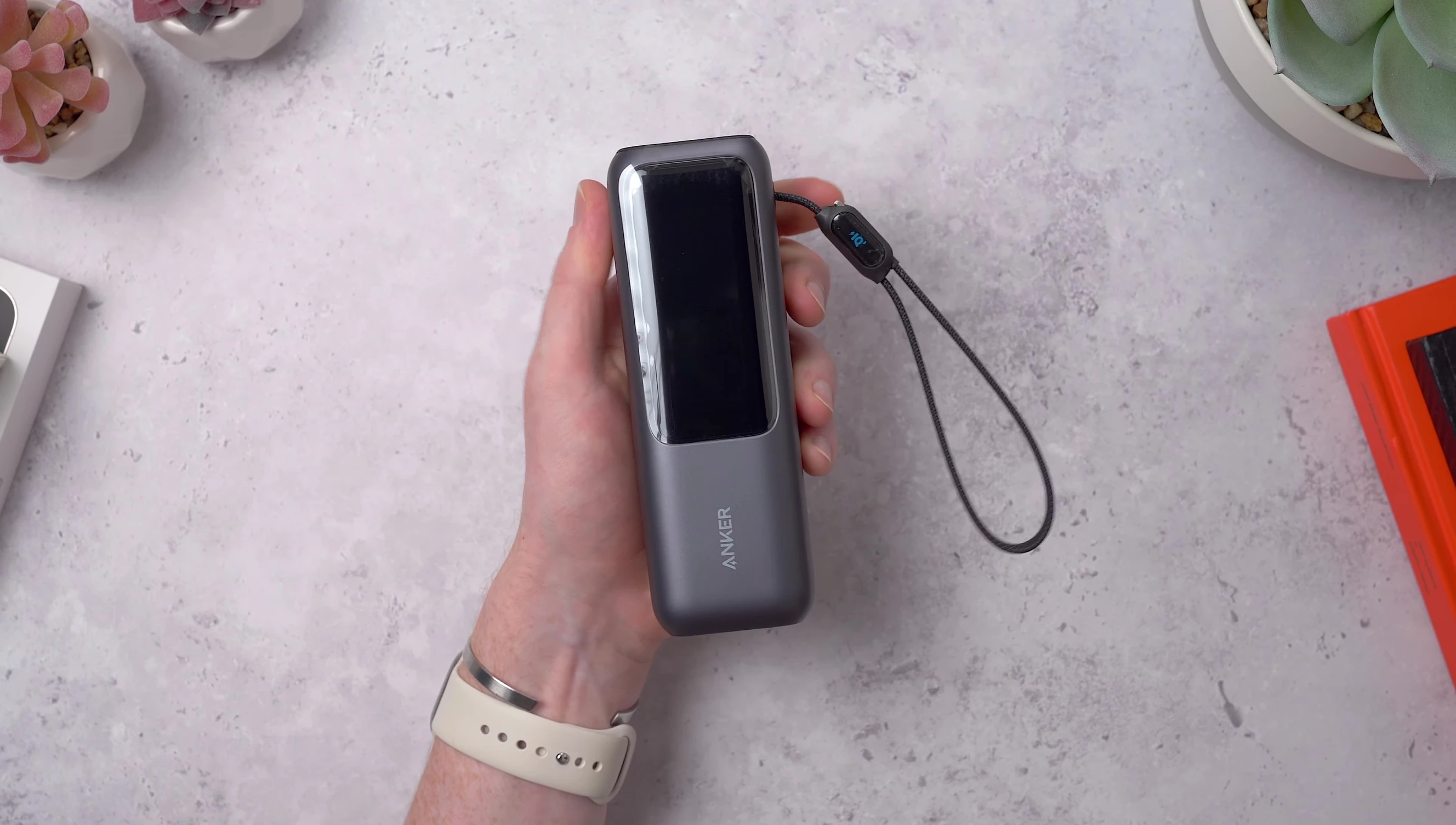 Anker power bank showing its rounded design