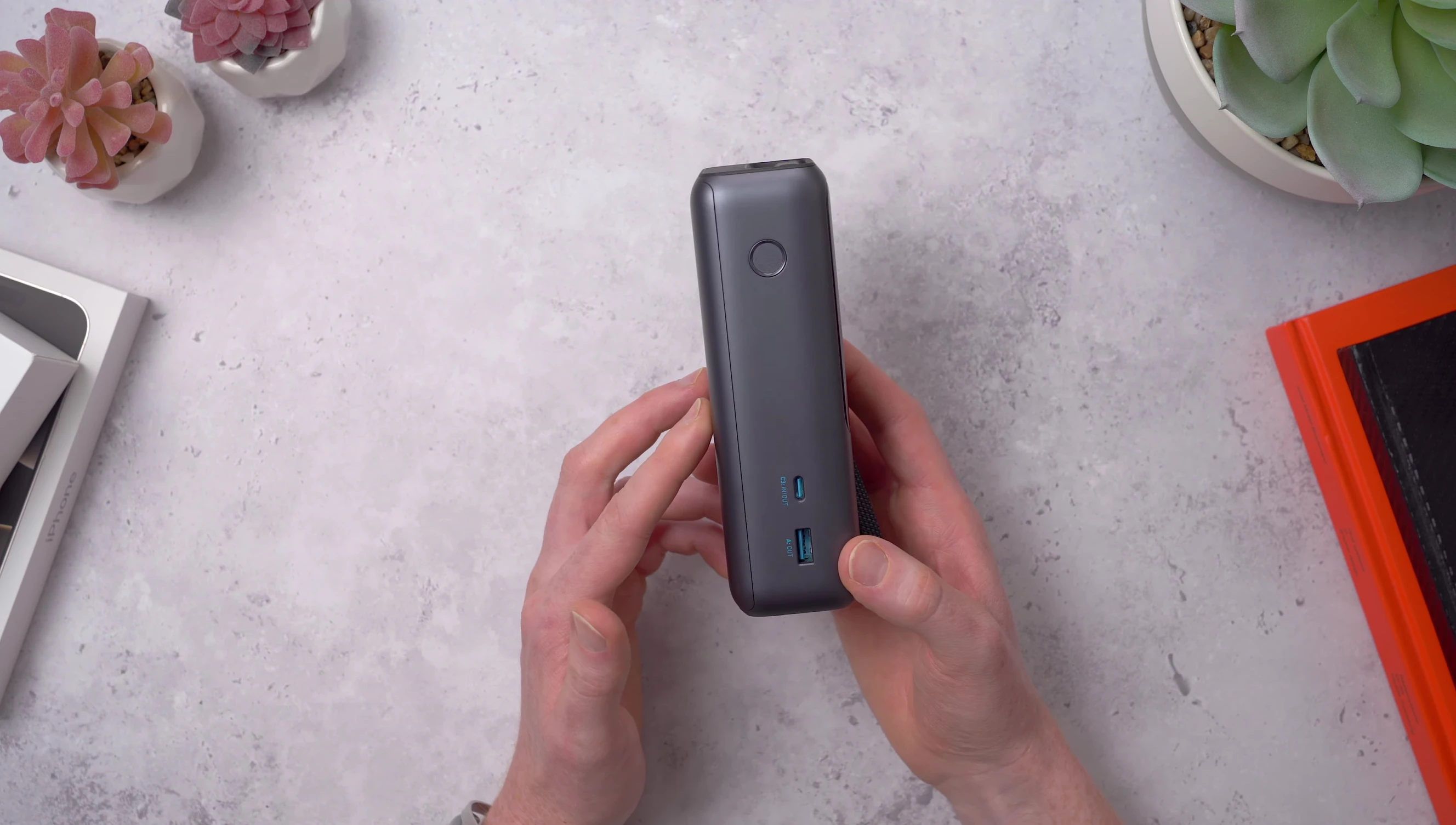 Size comparison of the Anker power bank to a soda can