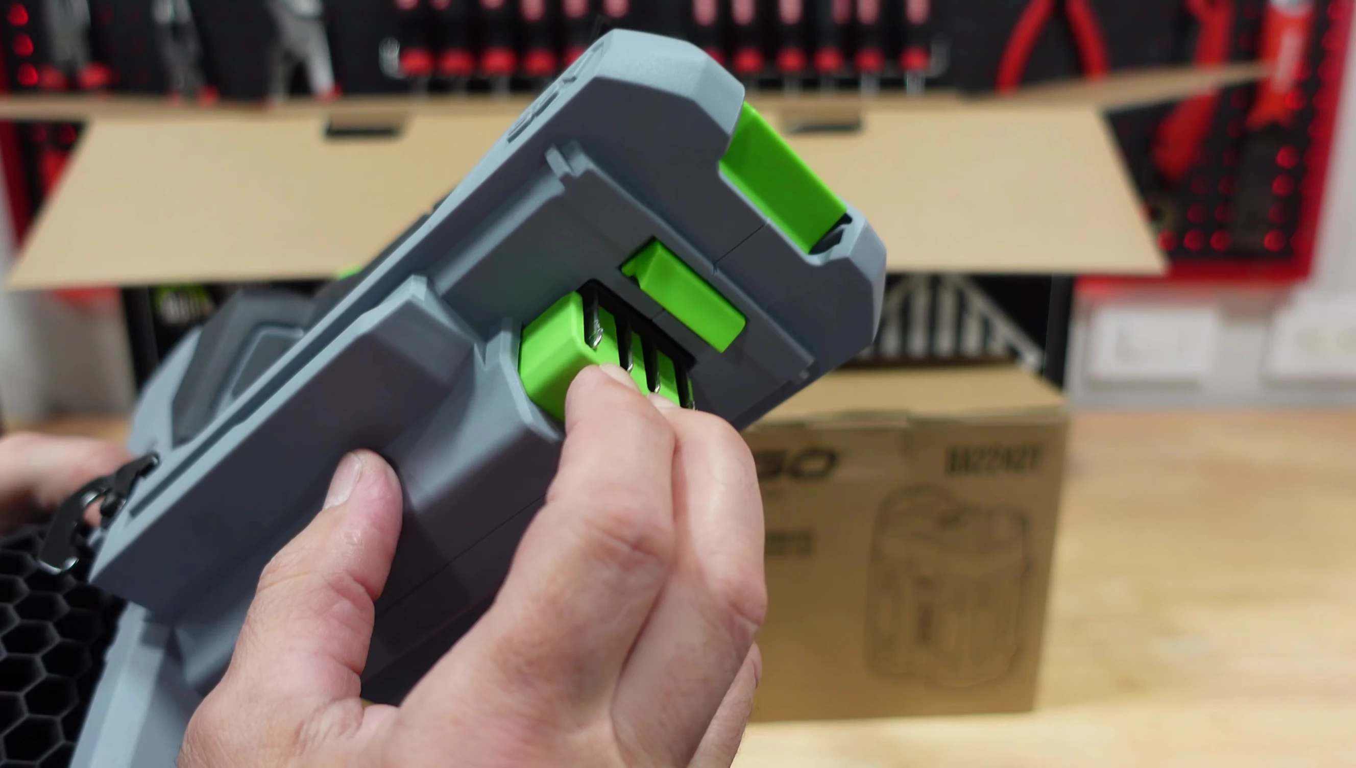 Close up of the digital display and new spring-loaded battery adapter