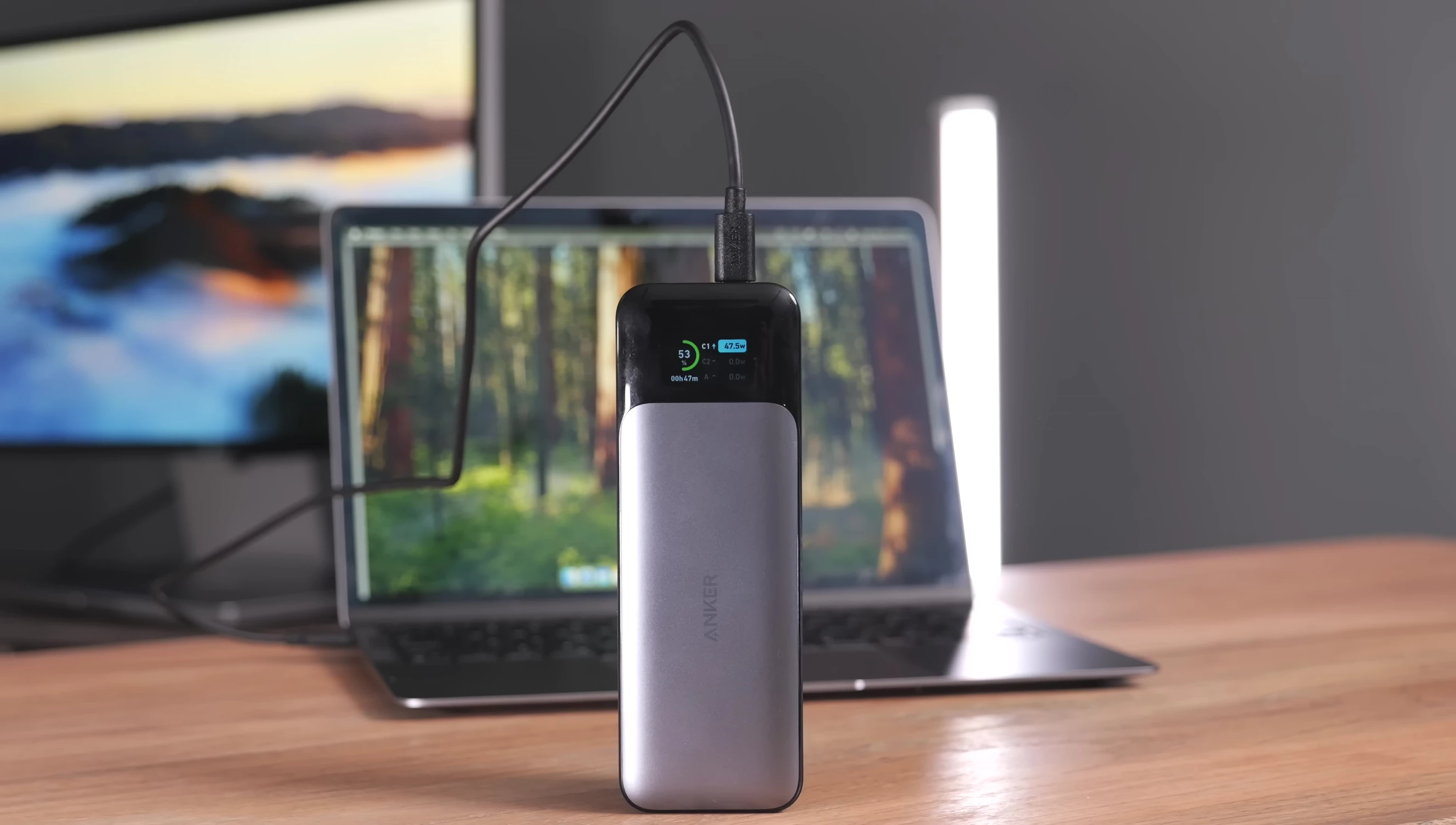 A screenshot showing the reviewer talking about using the power bank for MacBook Air/Pro.