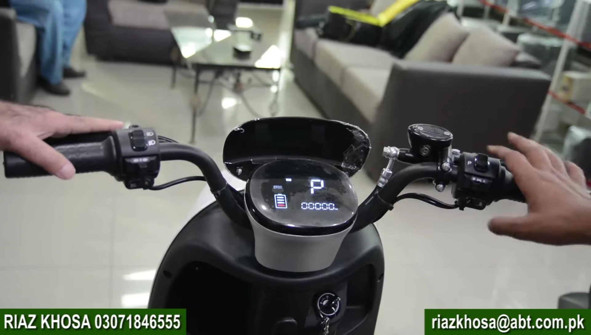 Shot of the bike's control panel, showing the reverse button.