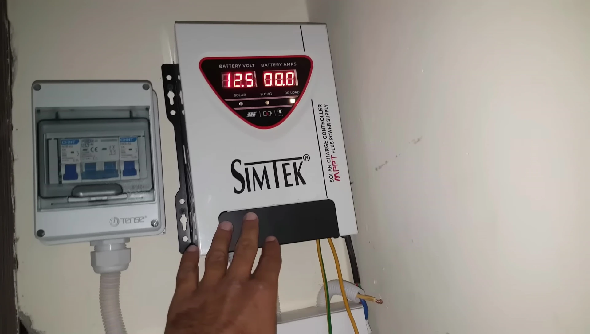 The controller installed and connected to solar panels and a load.