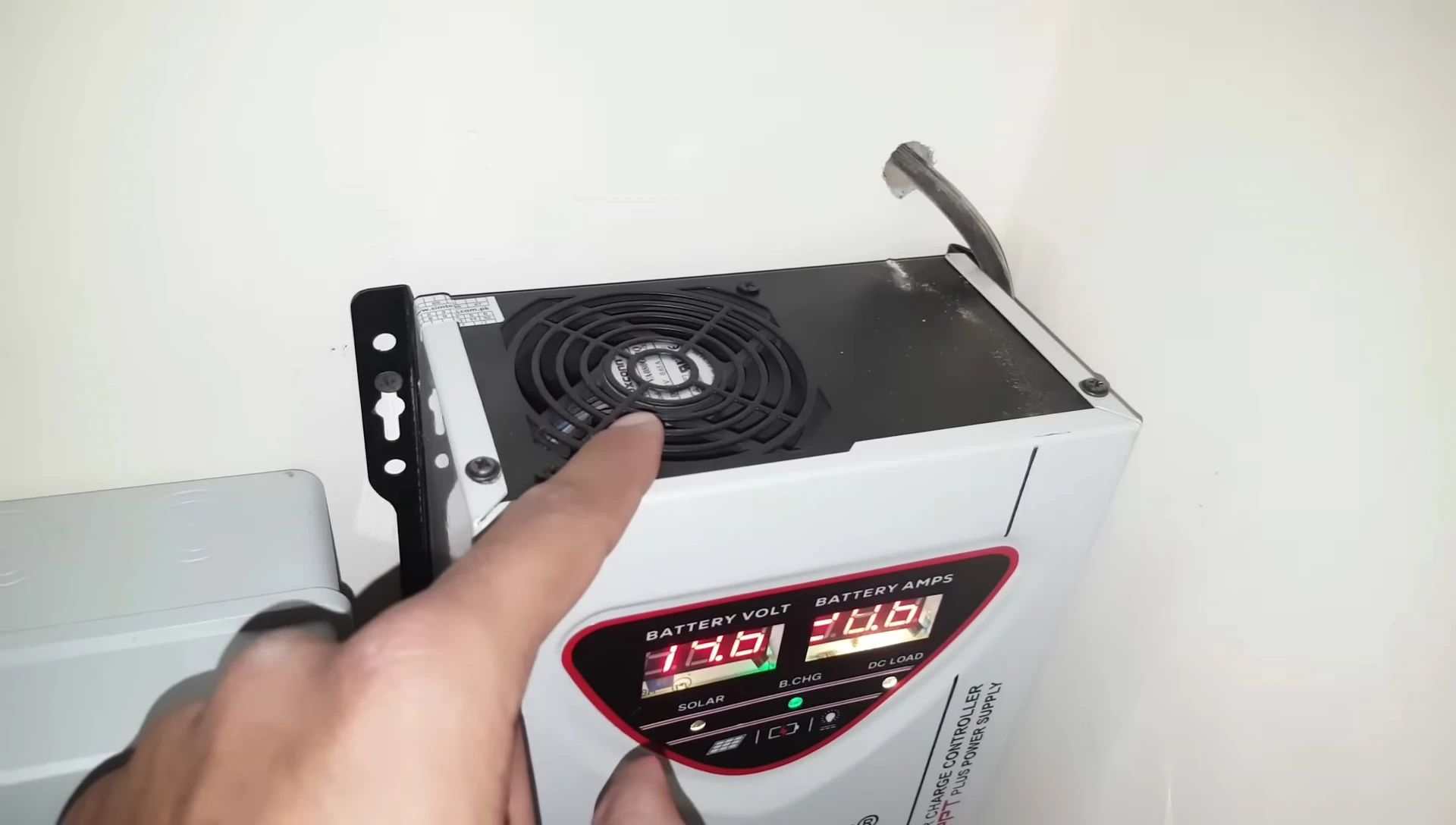 Cooling fan visible on the controller