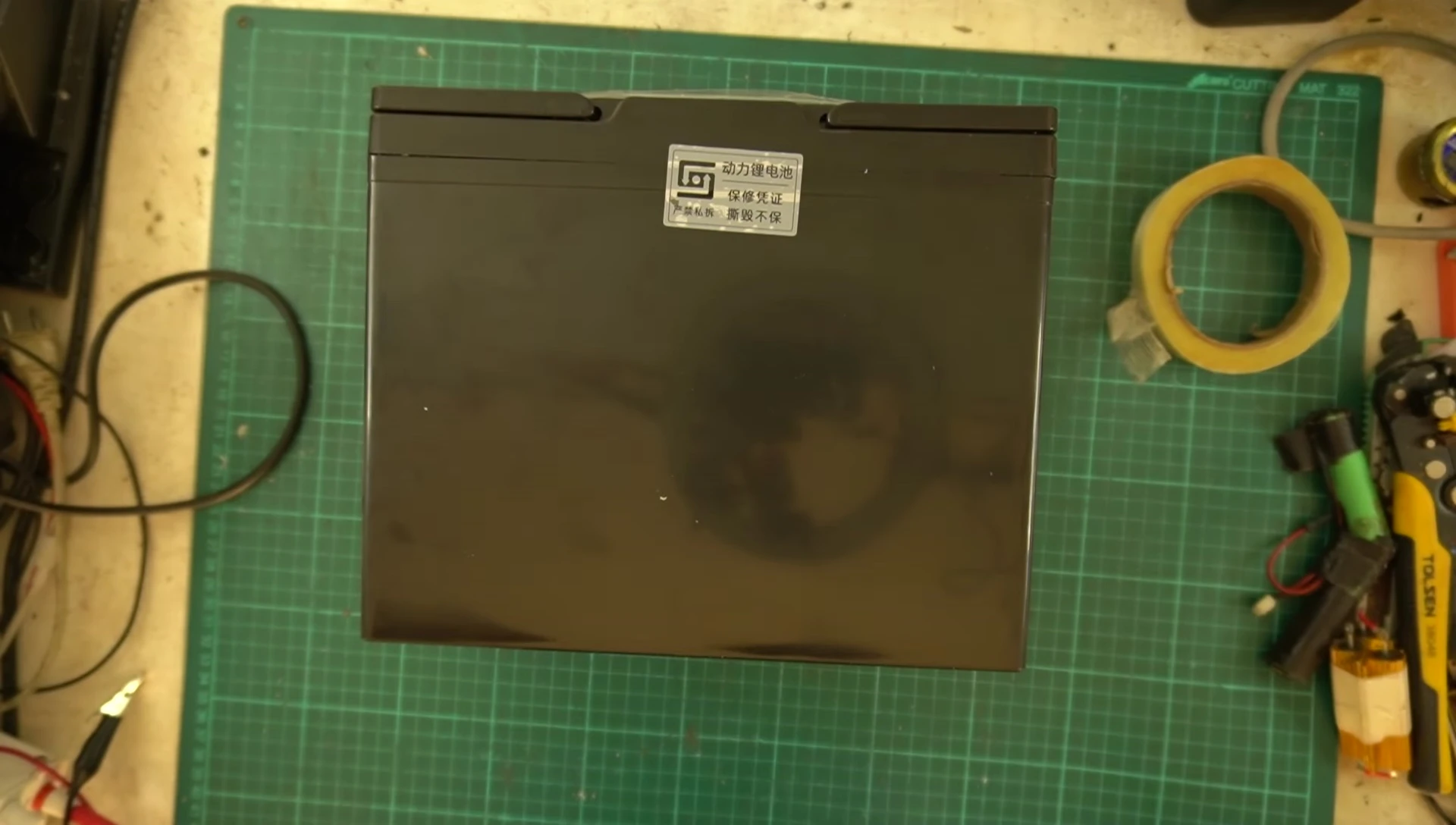 The void warranty sticker on the battery