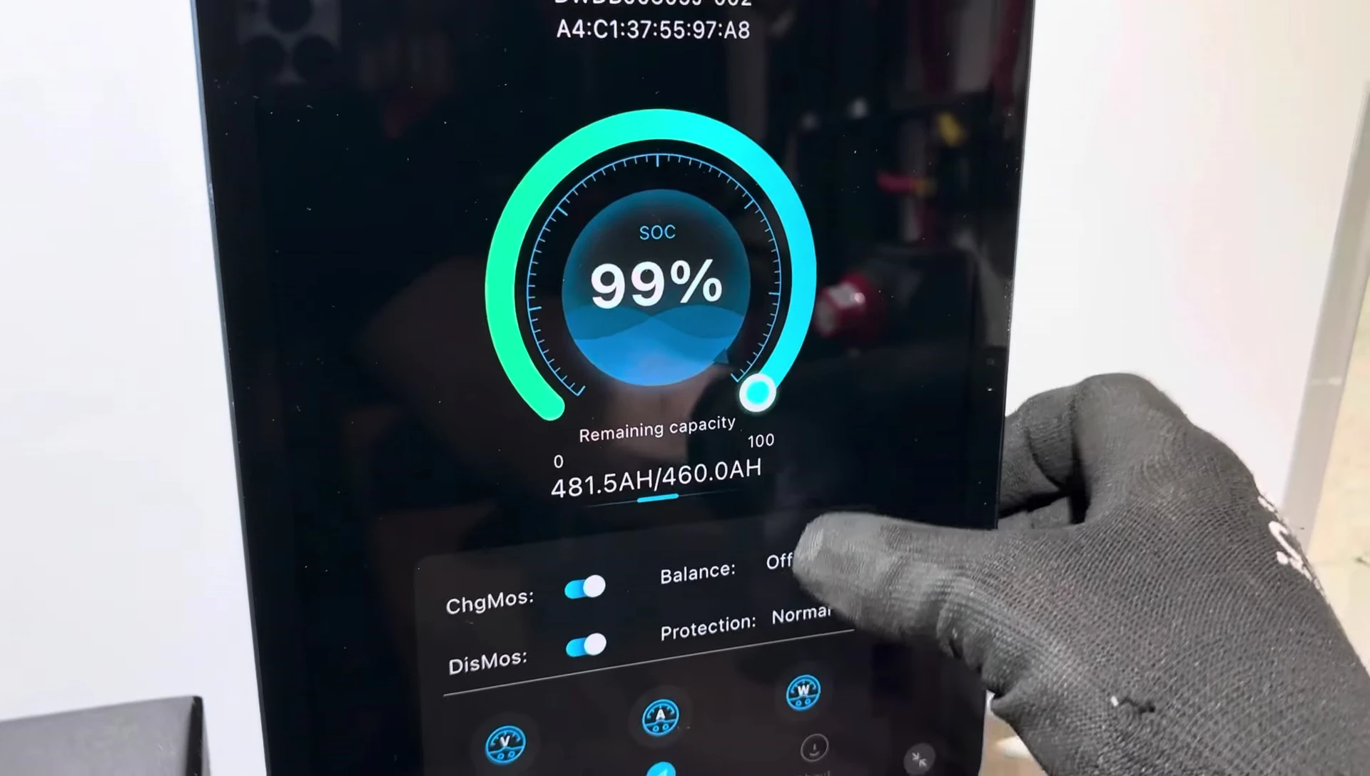 App readings during the load test showing voltage, amperage, and wattage.