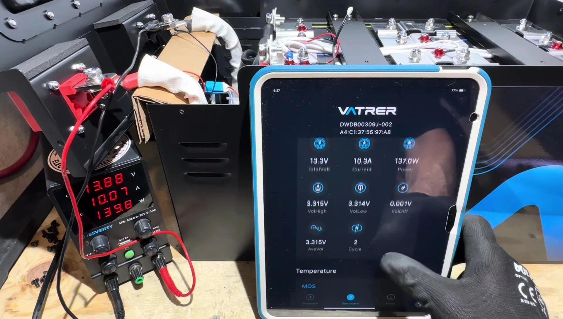 App data showing charging in progress.