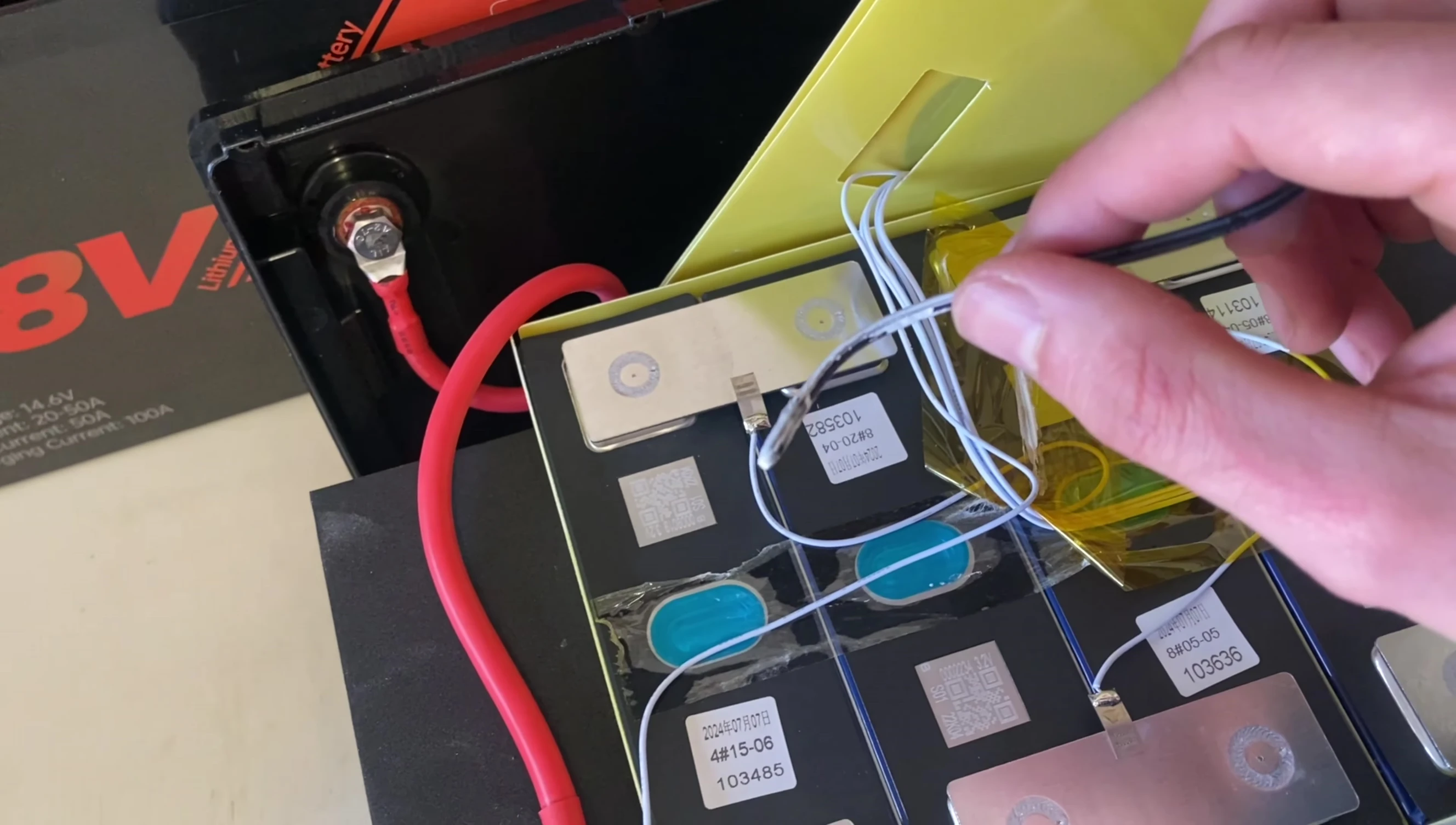 Testing high-temperature protection using a heat gun.