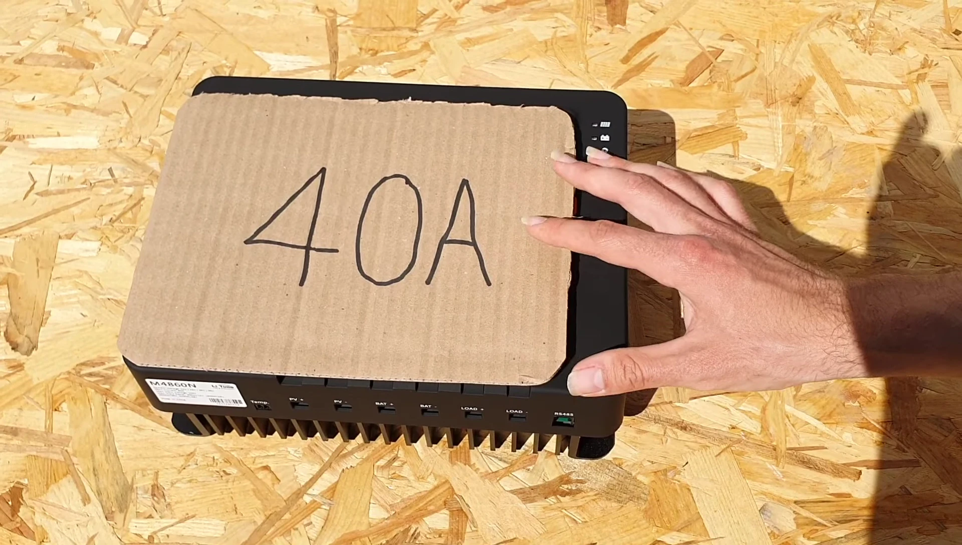 Another view of the charge controller highlighting its size