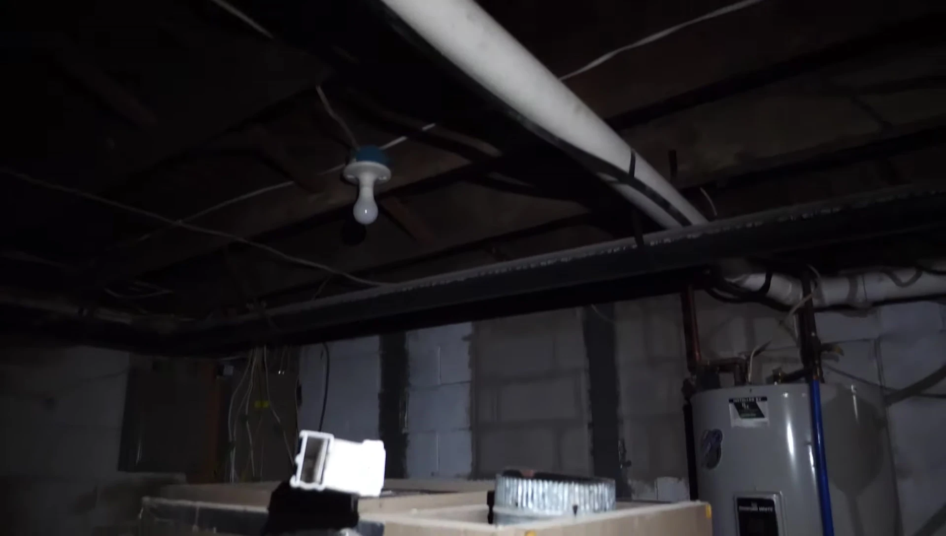 The old oil furnace in the basement