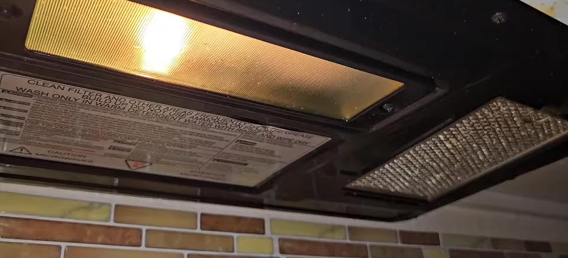 Removing the microwave's glass cover