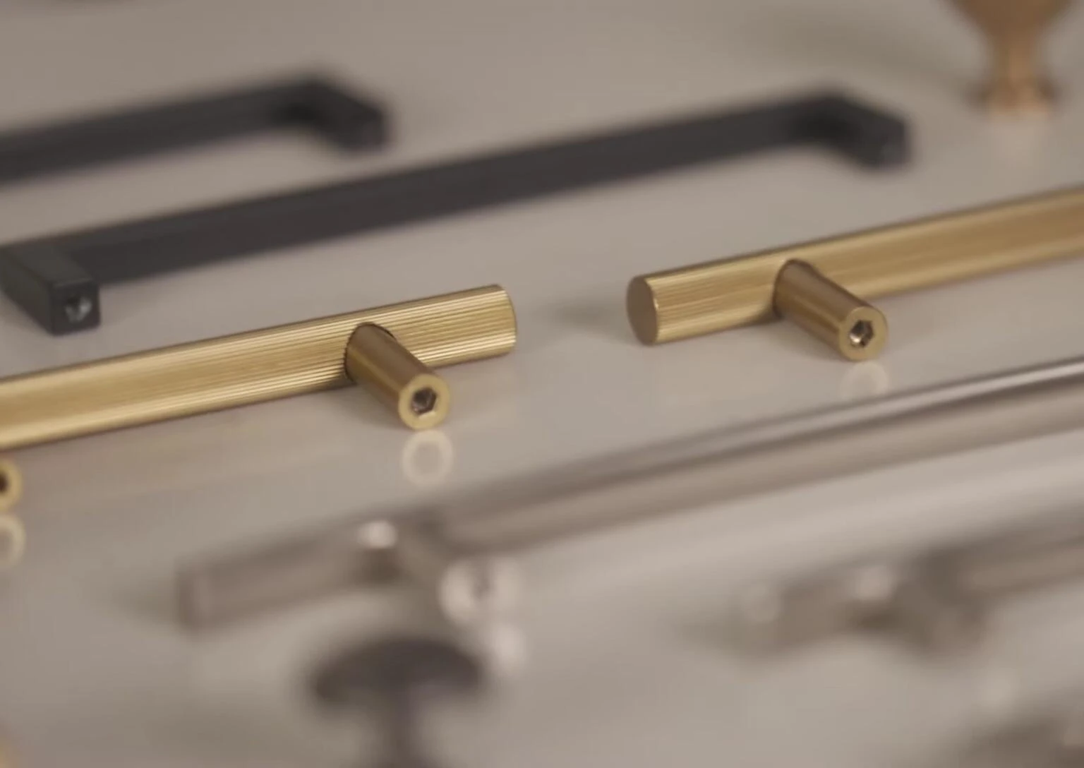 A modern kitchen with updated cabinet hardware