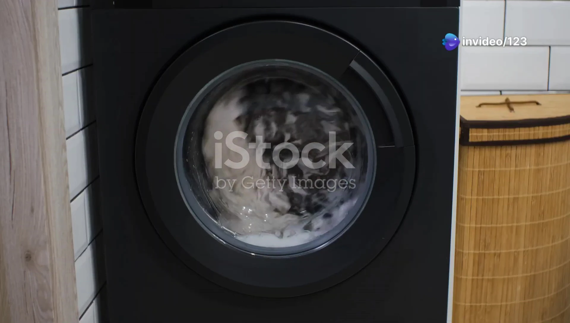 Close-up of the LG ThinQ AI washing machine control panel.