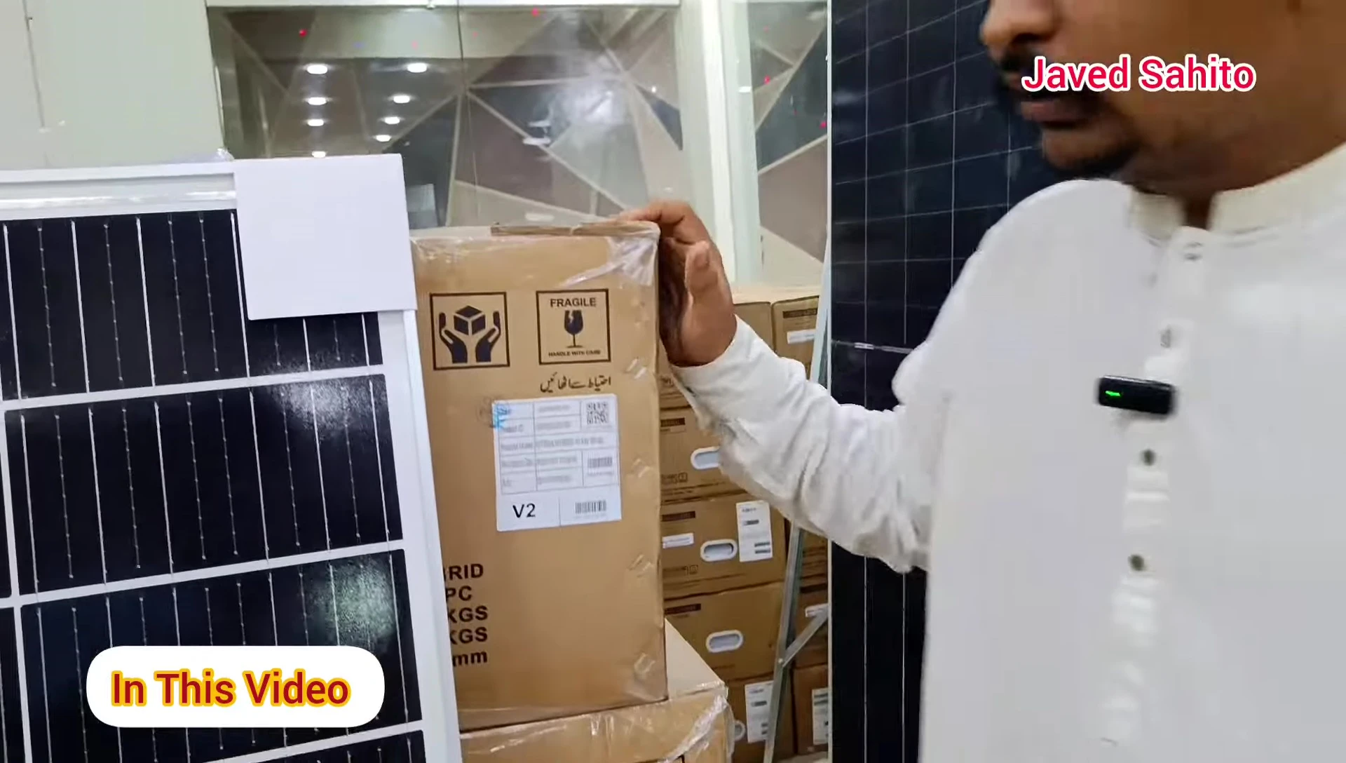 A JinkoSolar panel being showcased.
