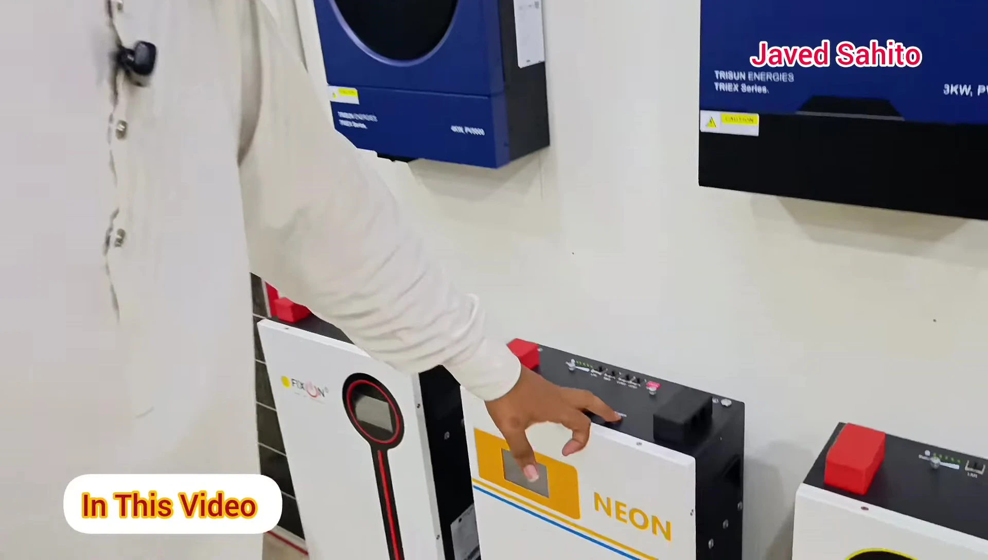 A person showcasing a powerful battery installation
