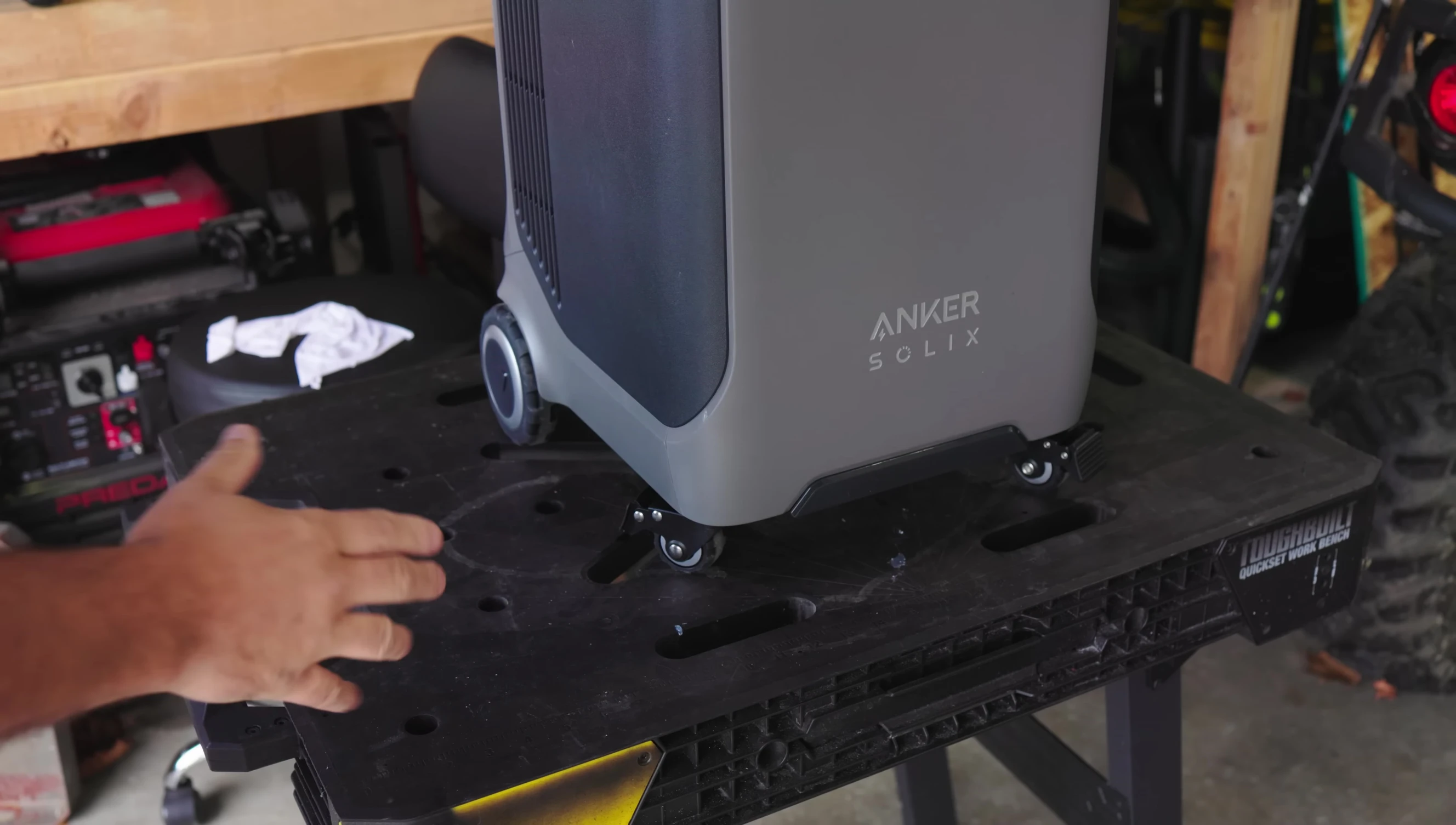 The unit showing its casters and handle.