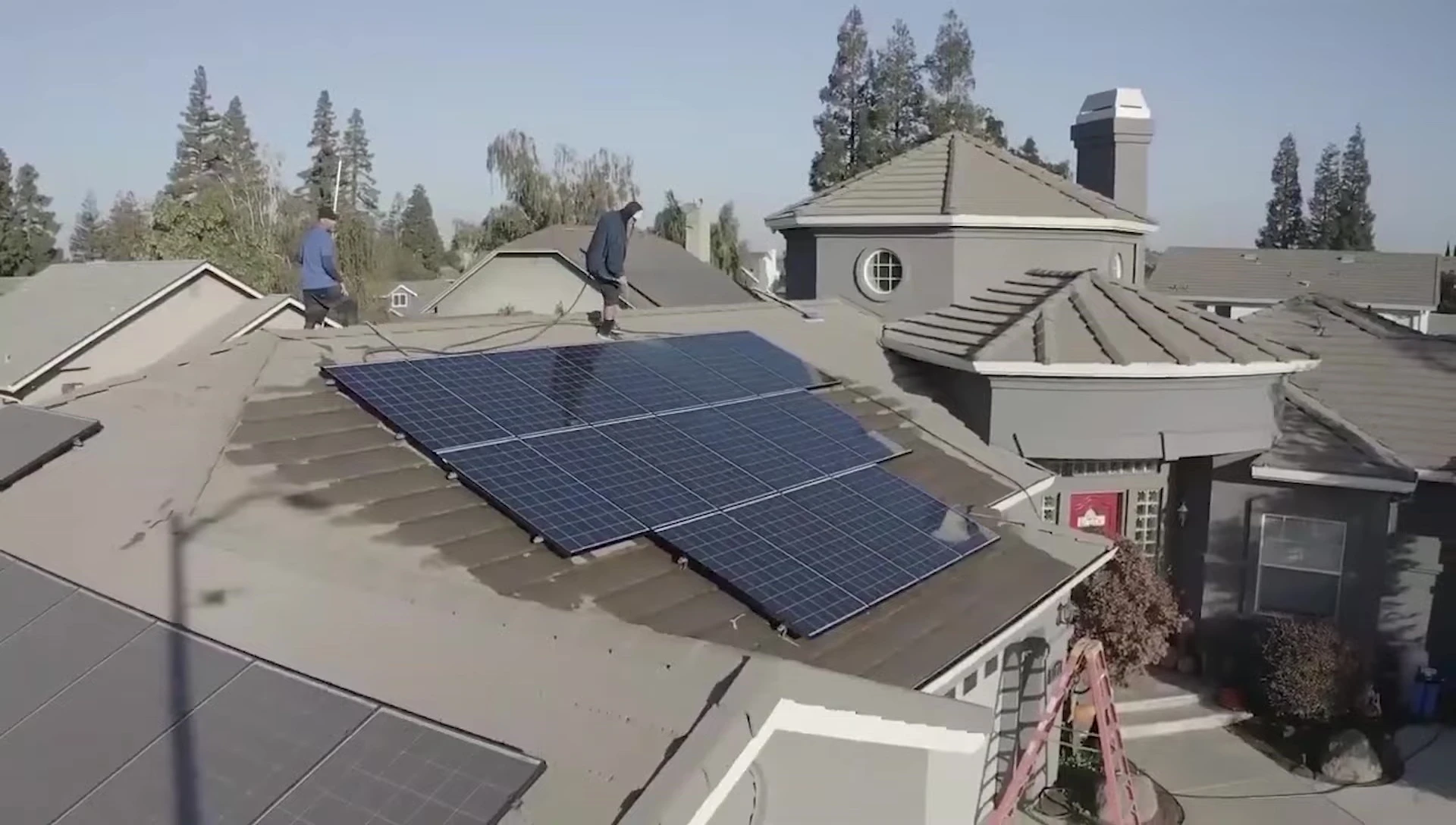 Image showing a complex solar panel setup and associated equipment.