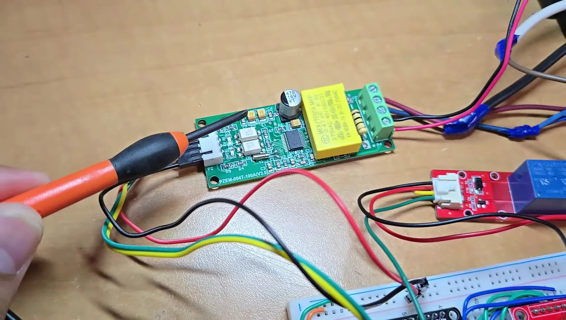 ESP32, PZEM-004T, relay, and TFT LCD connections on a breadboard