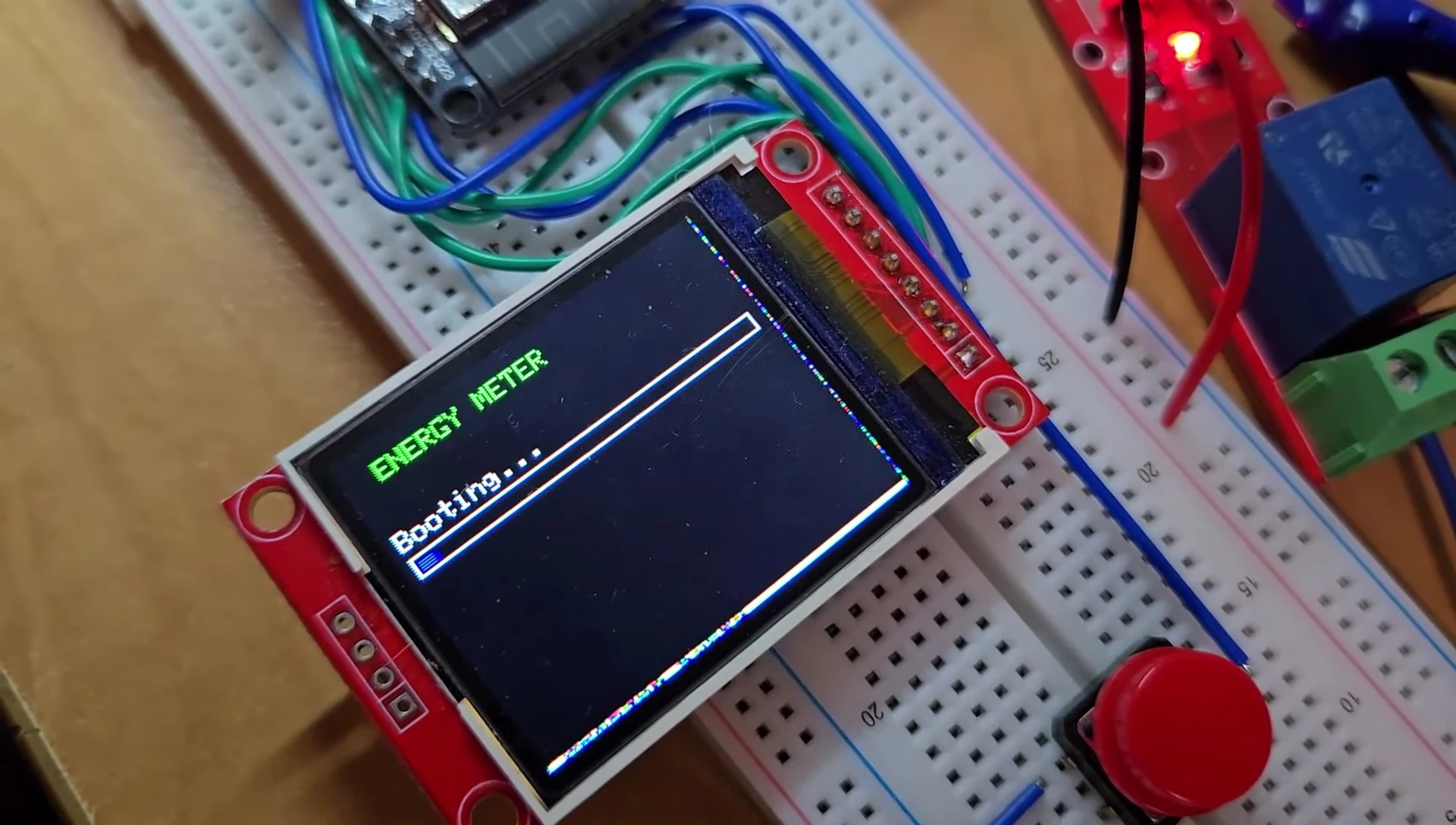 TFT LCD showing boot messages and IP address