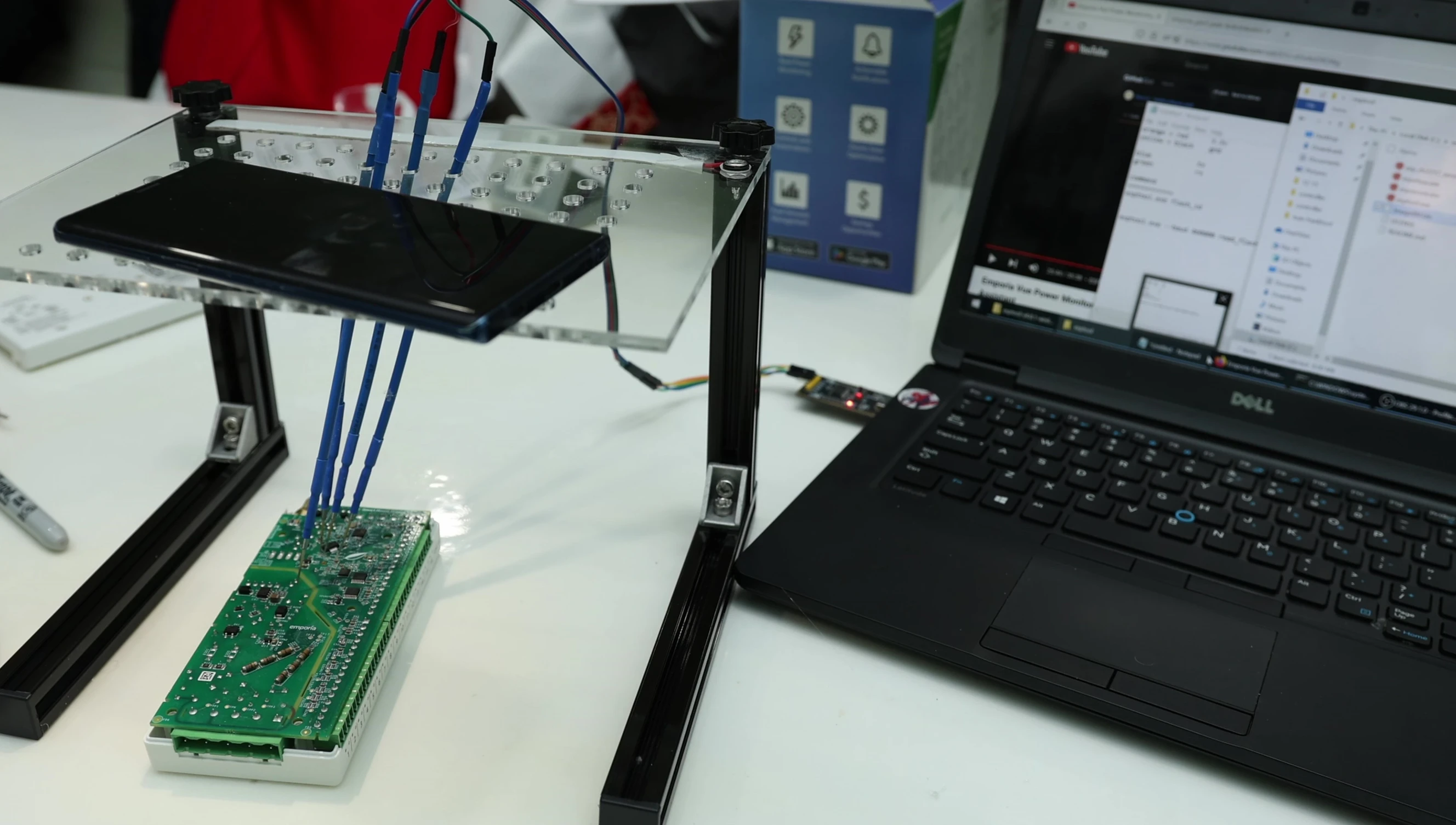 Close-up shot showing the connection of the BDM frame and probes to the Emporia unit's pins.