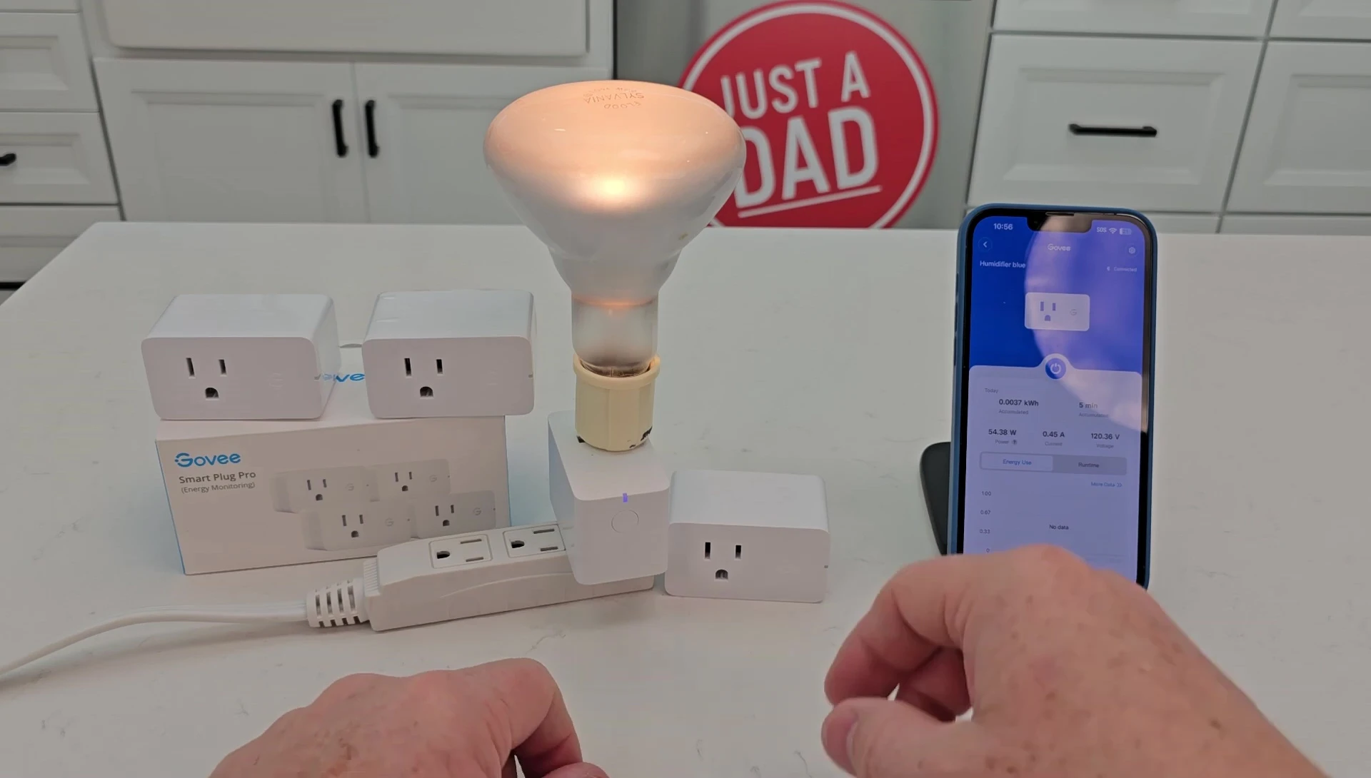 Close-up shot of the physical Govee smart plug showcasing the manual switch