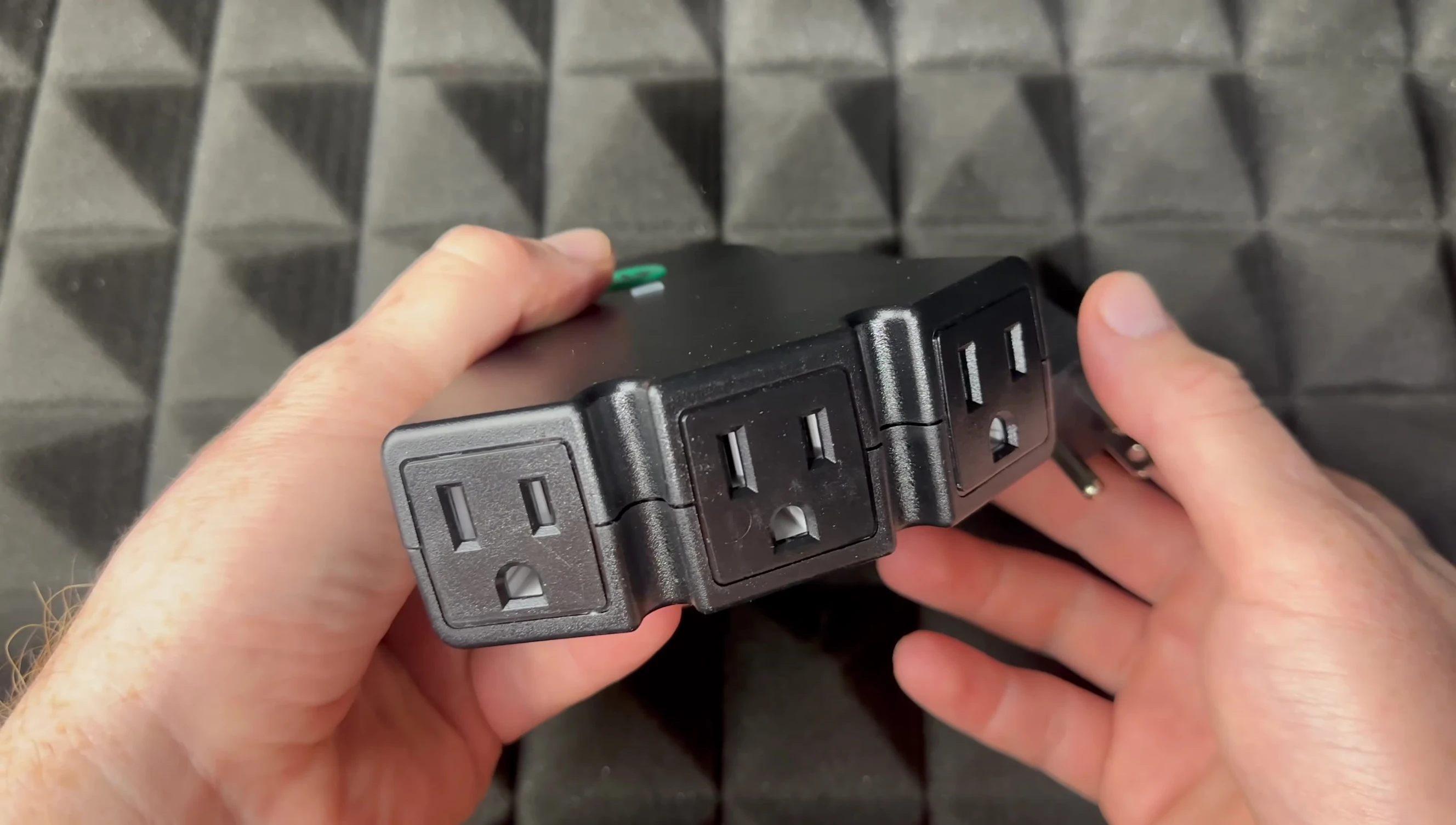 Close-up of the BN-LINK Smart WiFi Outdoor Outlet showing the angled outlets