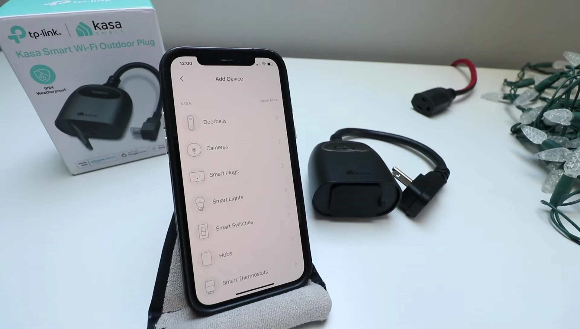 Screenshot showing the outdoor plug being plugged into an outdoor power outlet.