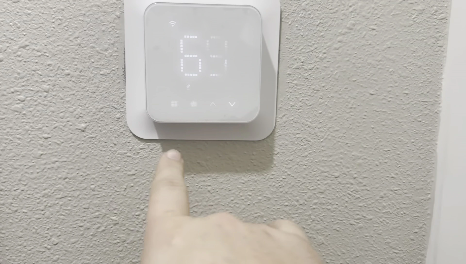 Close up of the thermostat, showing its display