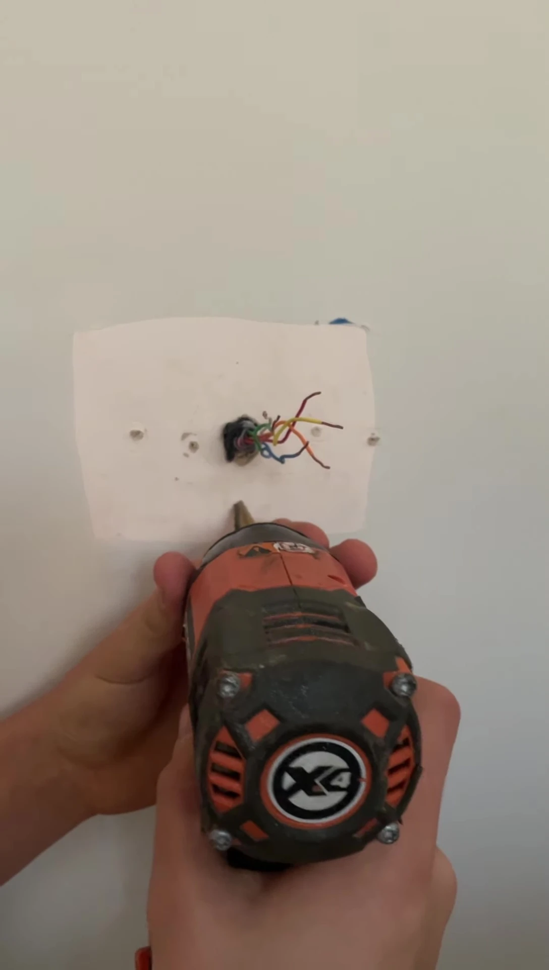 Drilling holes for the Ecobee Lite mounting plate.