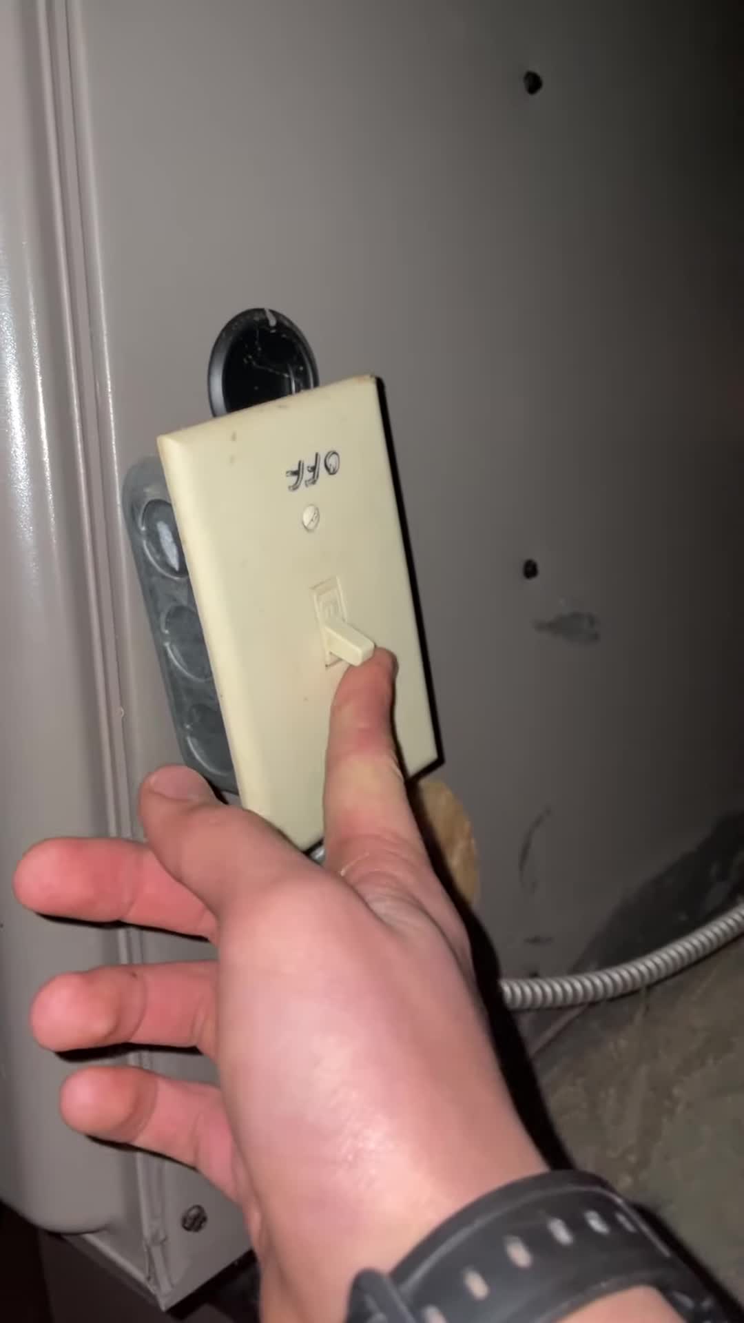 Turning off the furnace power switch.