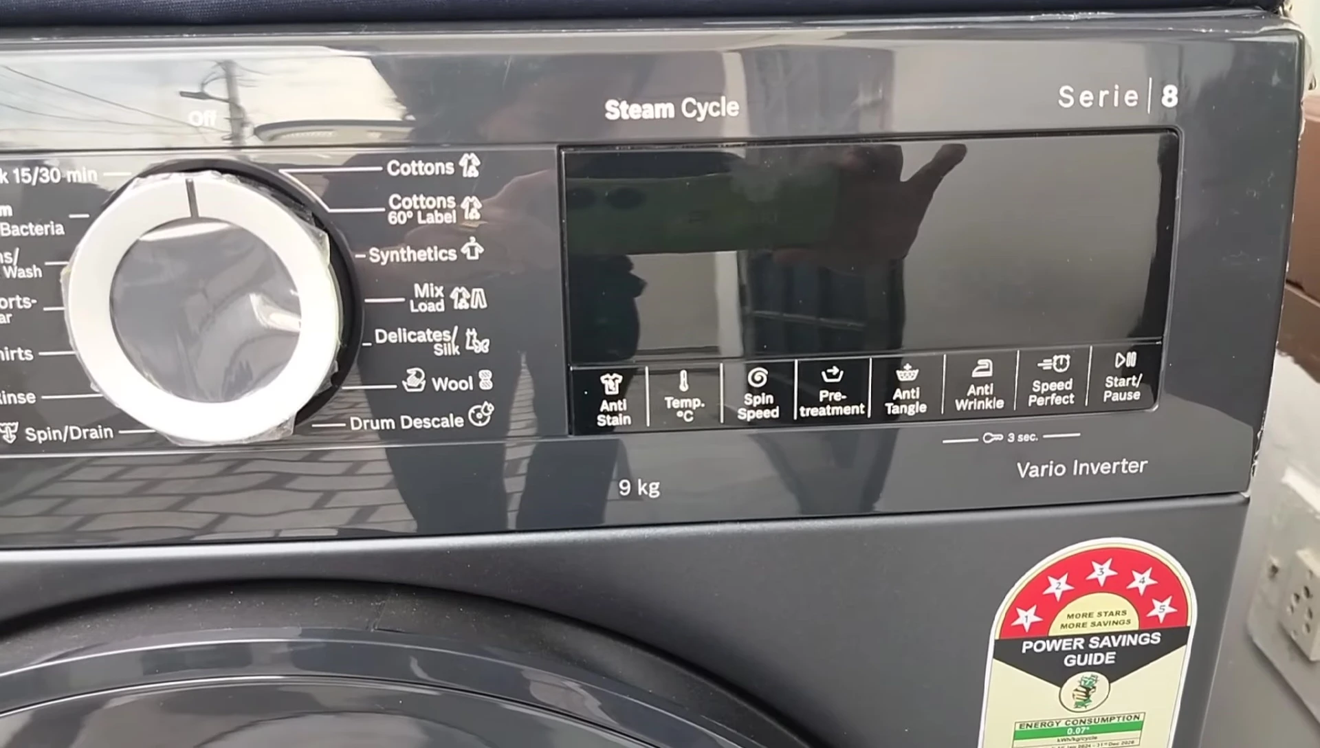 Close-up of the control panel showcasing various functions and settings.