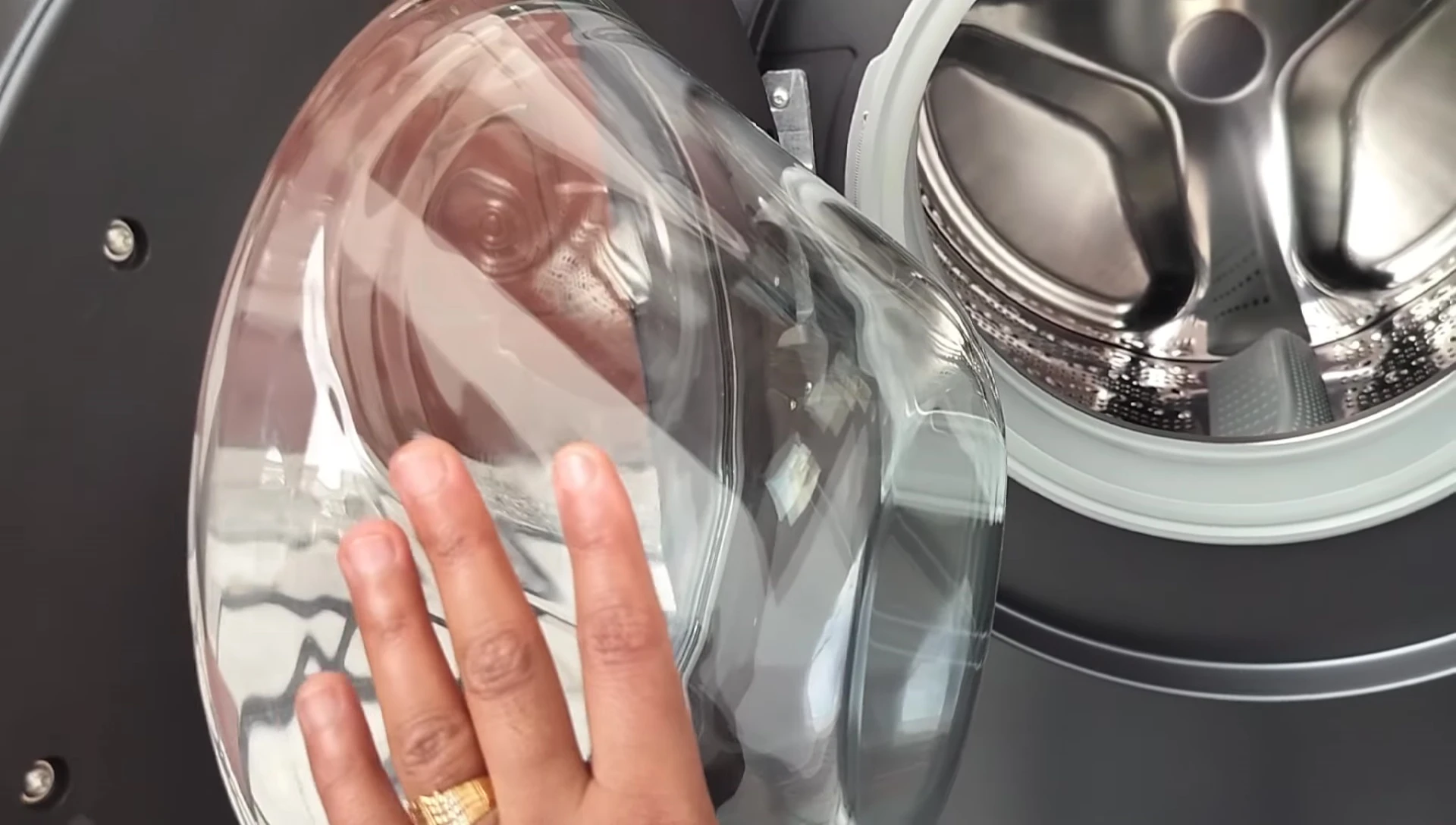 Close-up of the washing machine door, showcasing its enhanced design.