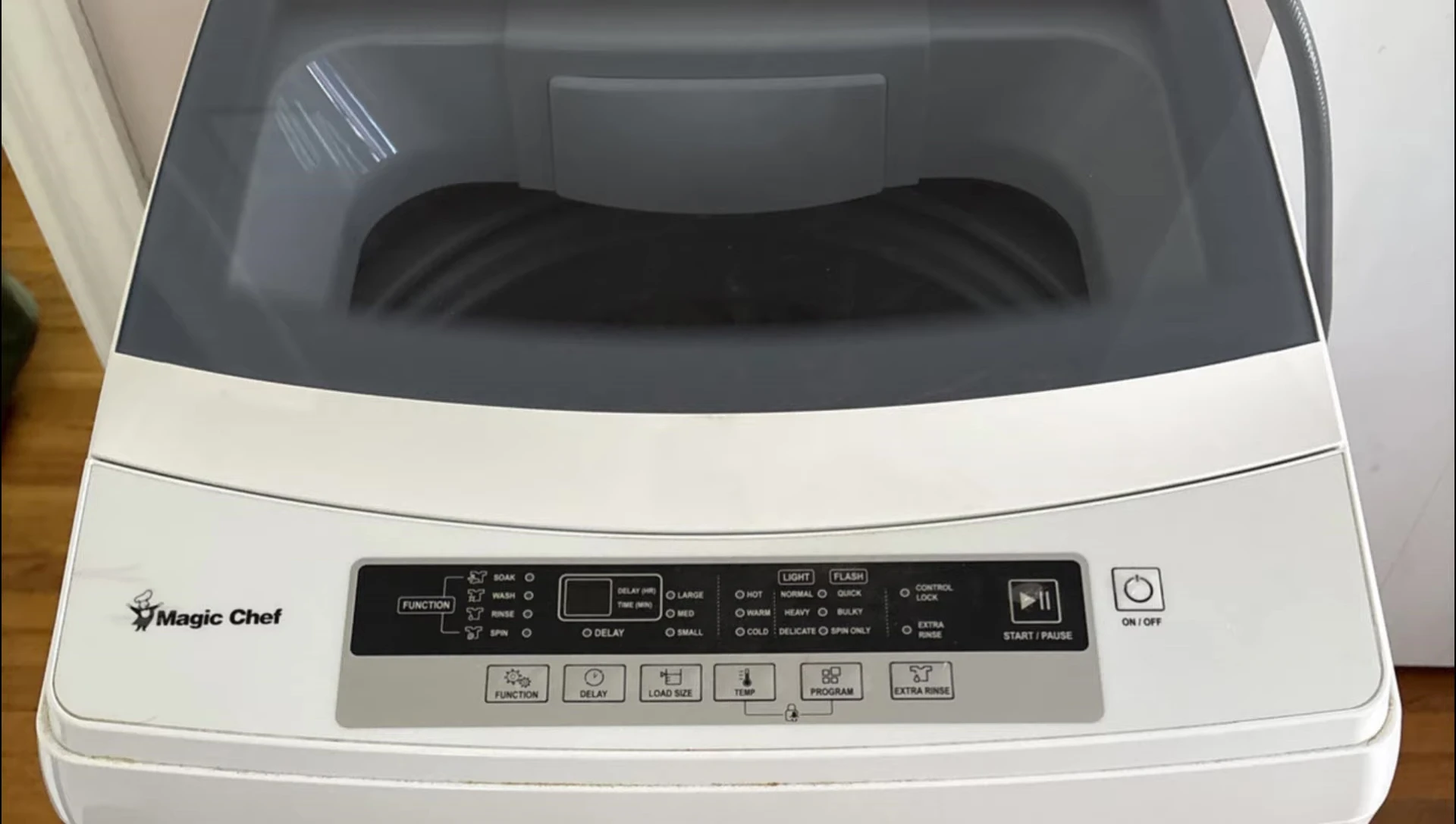 Close-up of the Magic Chef's control panel and viewing window