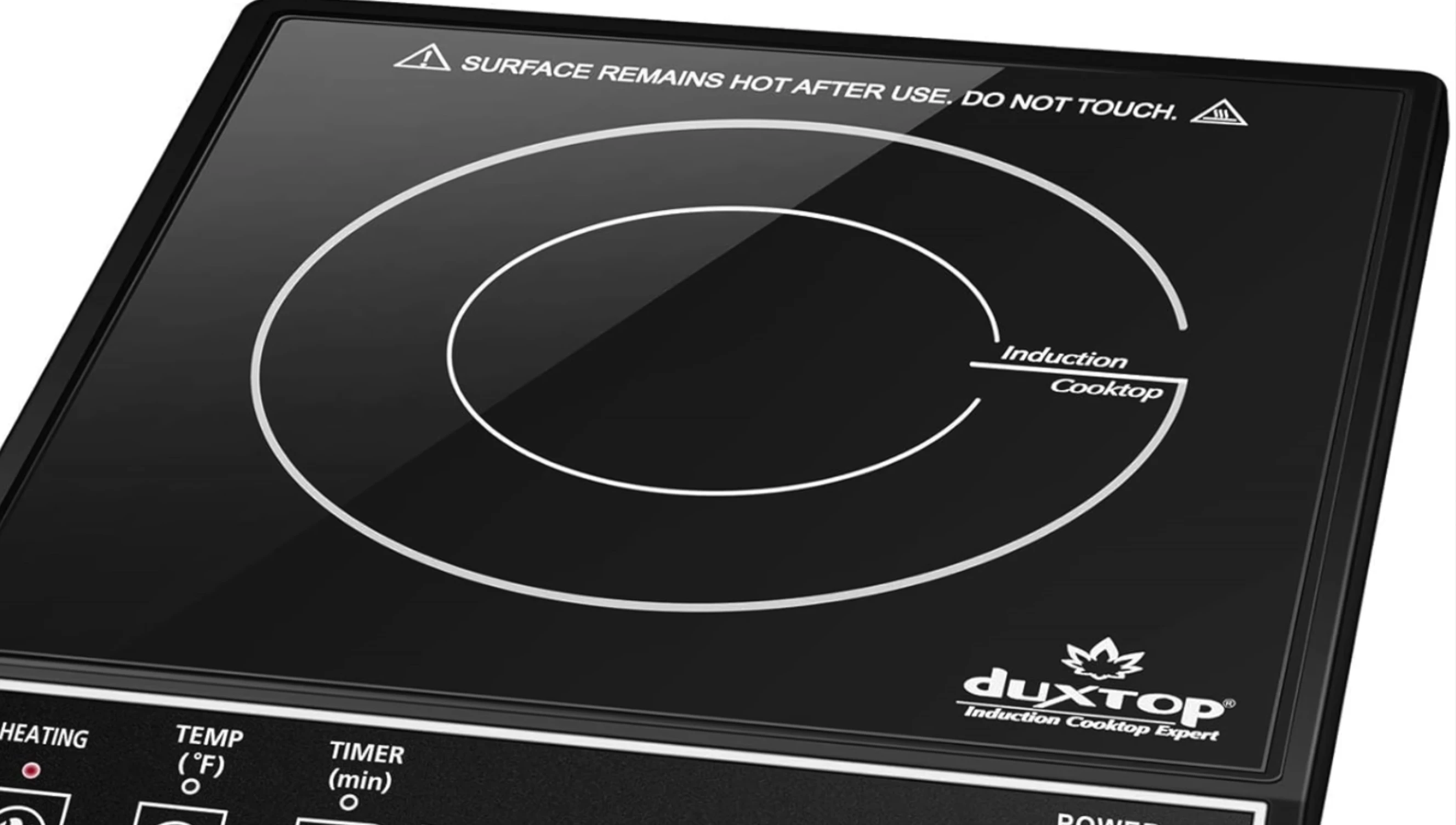 The cooktop showing its sleek black design
