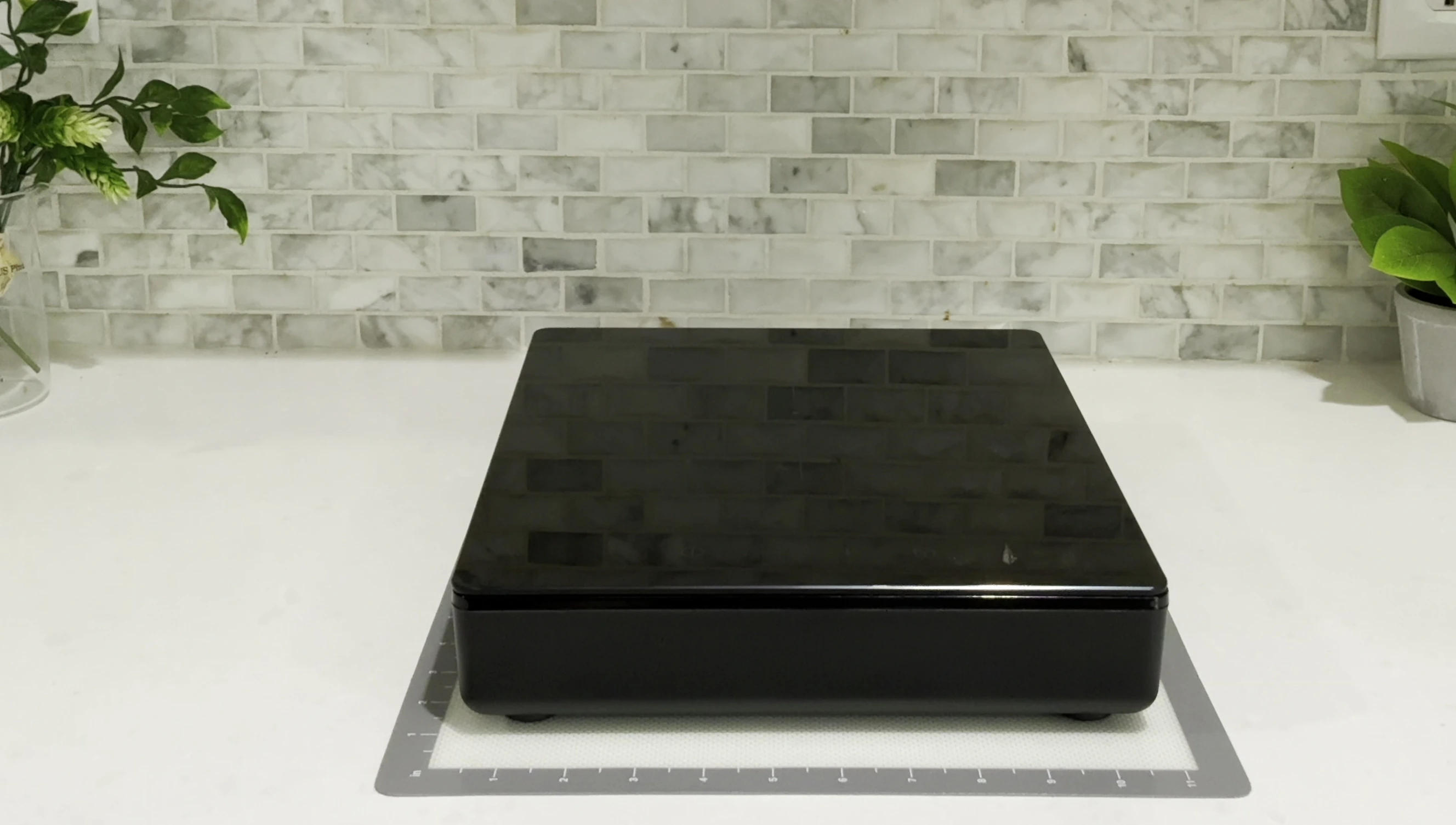 The IKEA Tillreda cooktop in its entirety, showing the rectangular shape and black color.