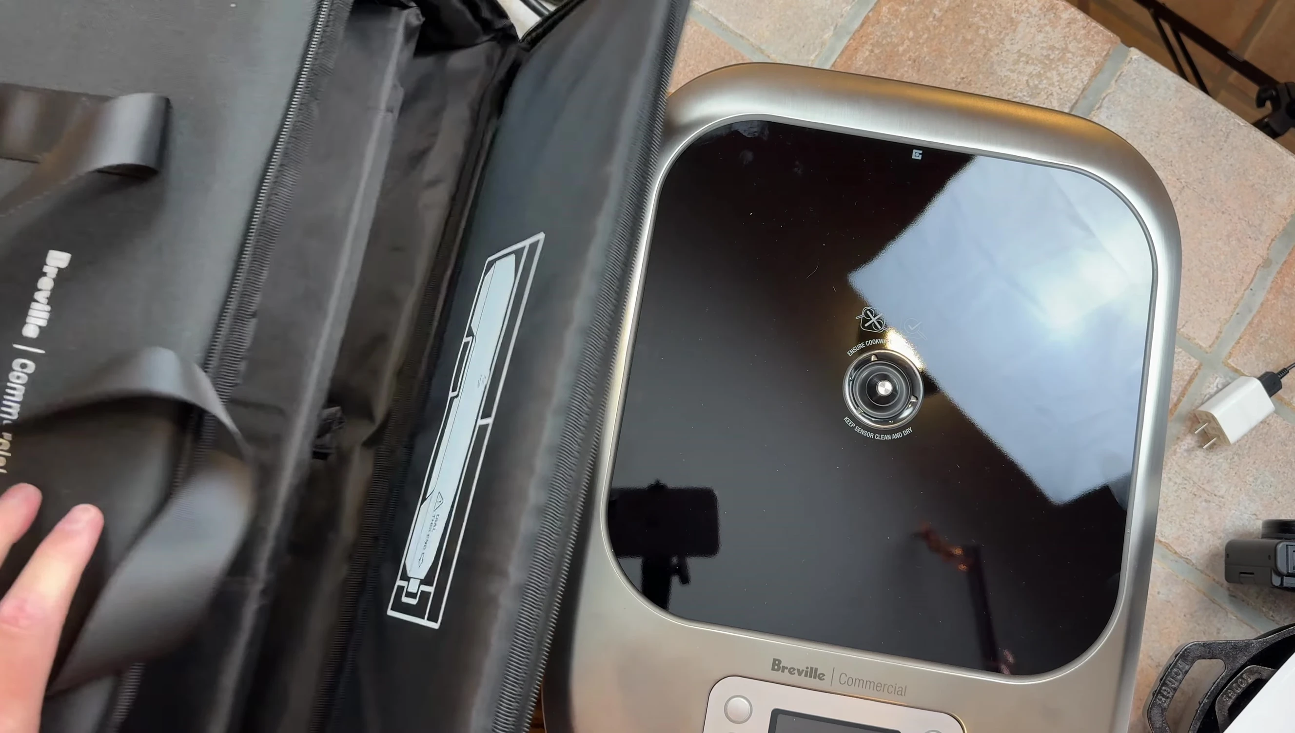 The commercial-grade unit in its carrying case.