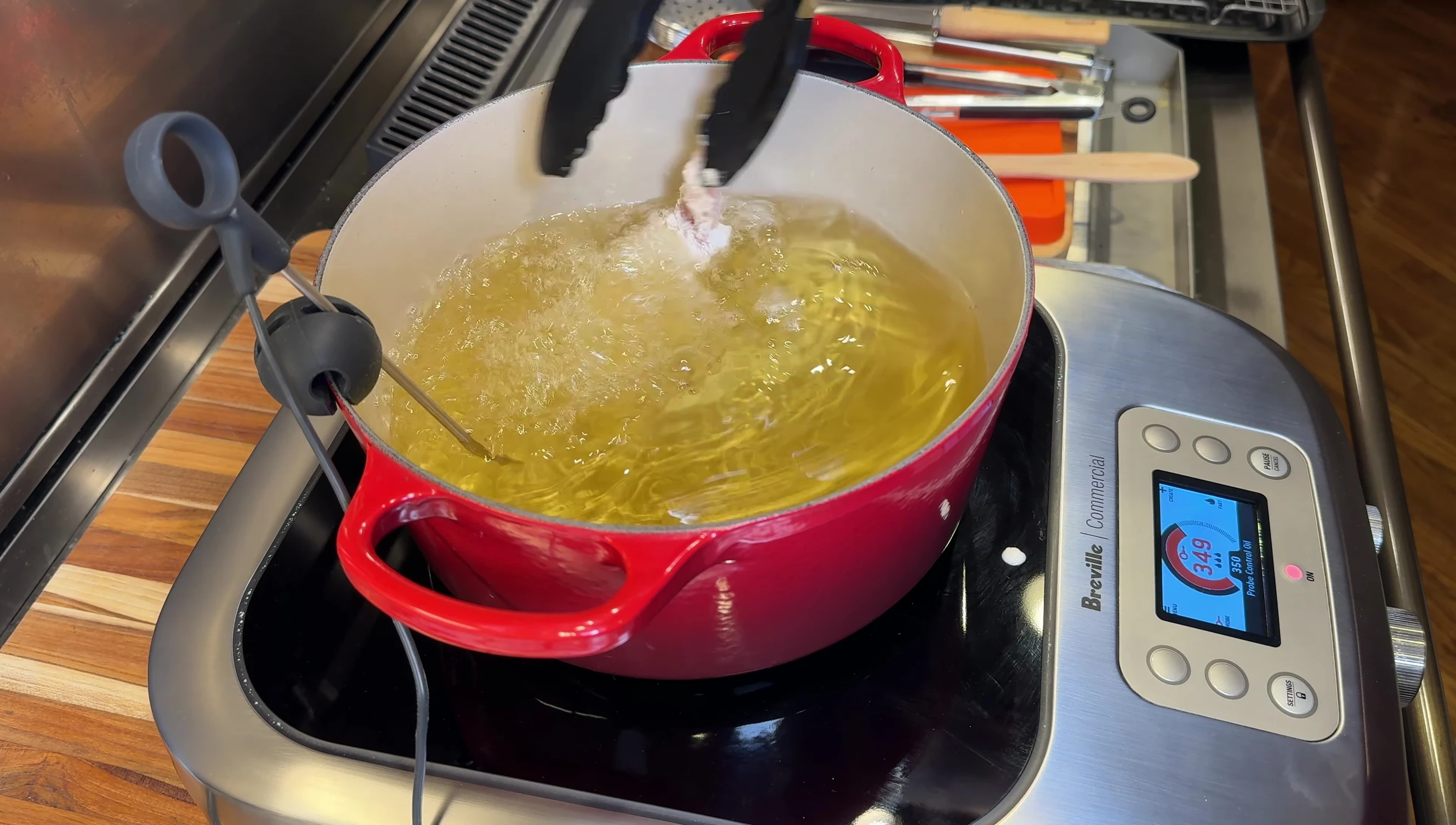 Close up of the temperature probe in the oil.