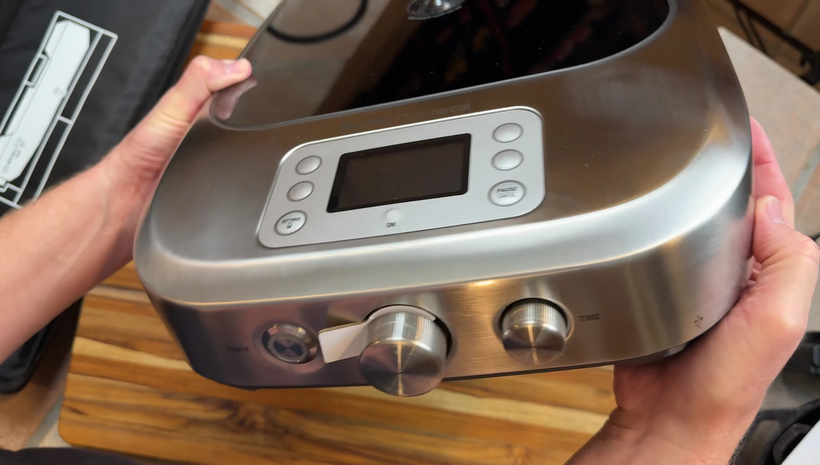 Close-up of the control dial and digital display showing precise temperature settings.