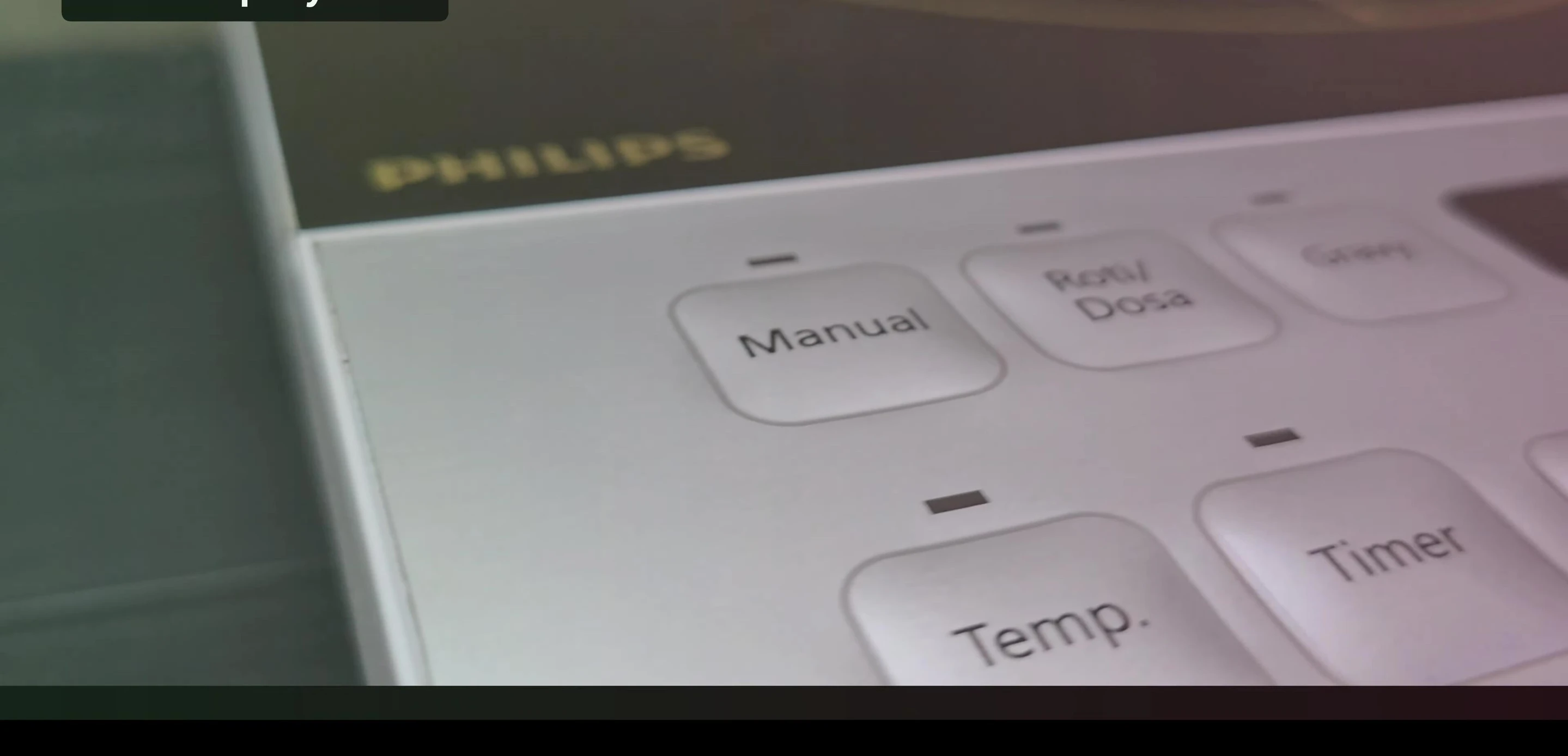 The control panel displaying the touch controls and LED display.