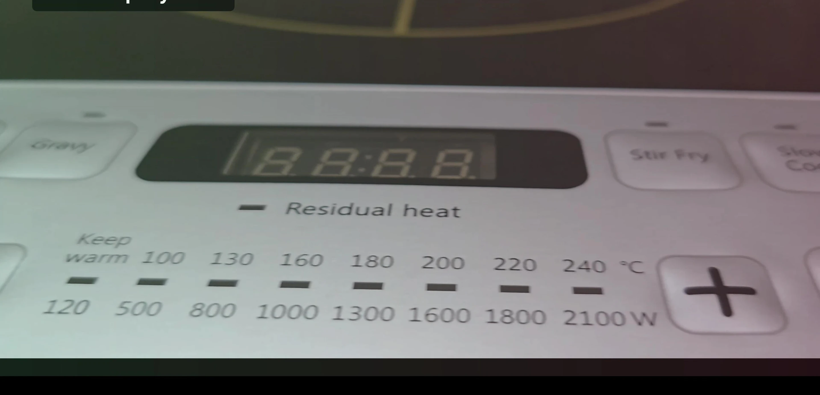 The cooktop displaying the pre-set cooking menus.