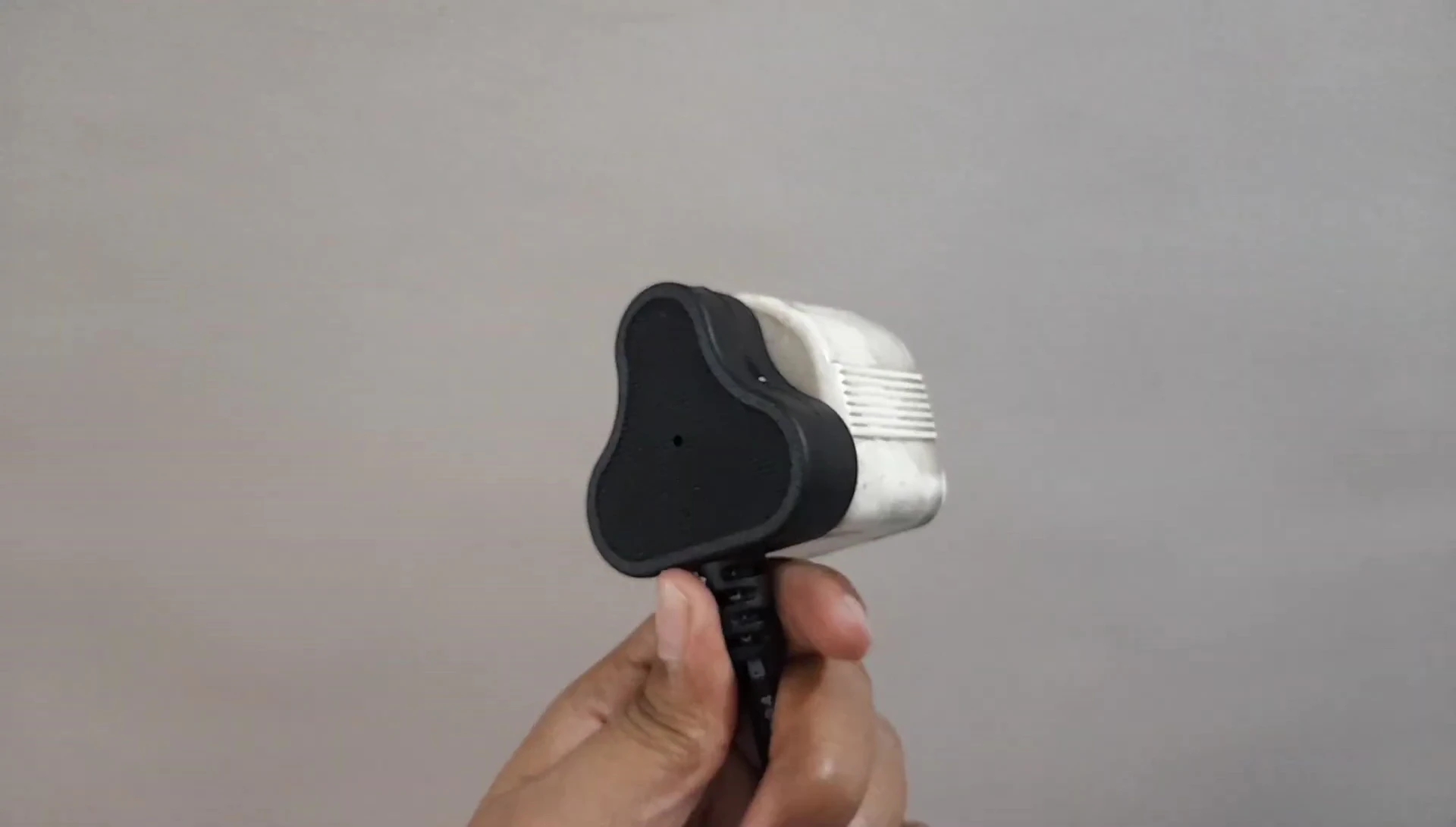 The reviewer's makeshift solution to the plug compatibility problem.