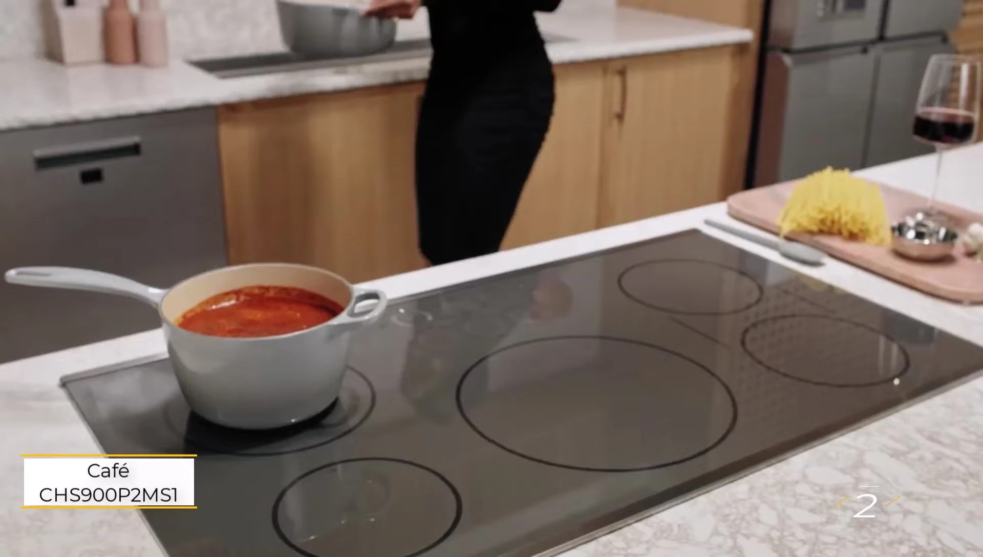 The Cafe Induction Range showcasing its sleek design and touchscreen