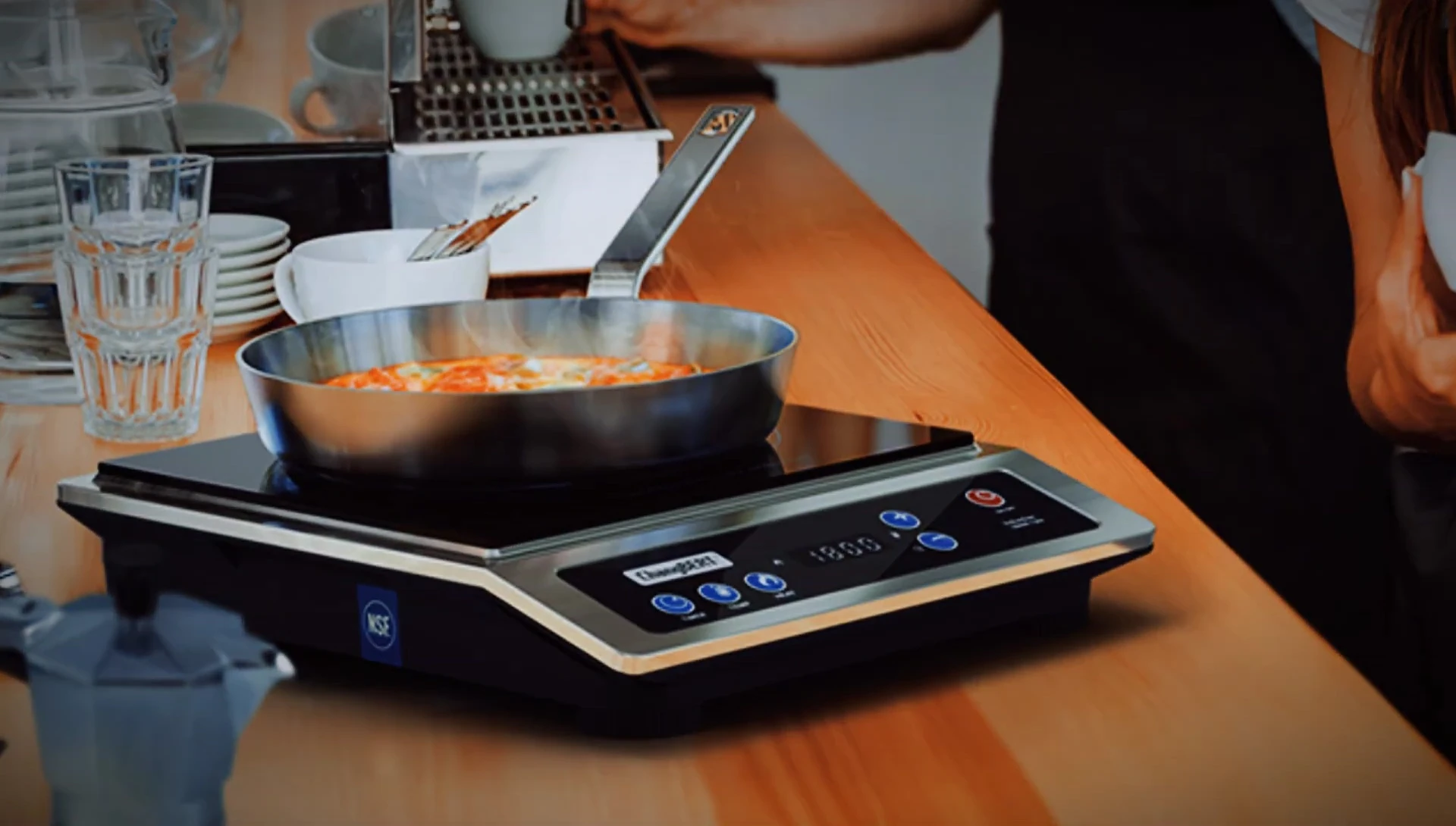 The angled control panel of the cooktop, highlighting the ease of use.