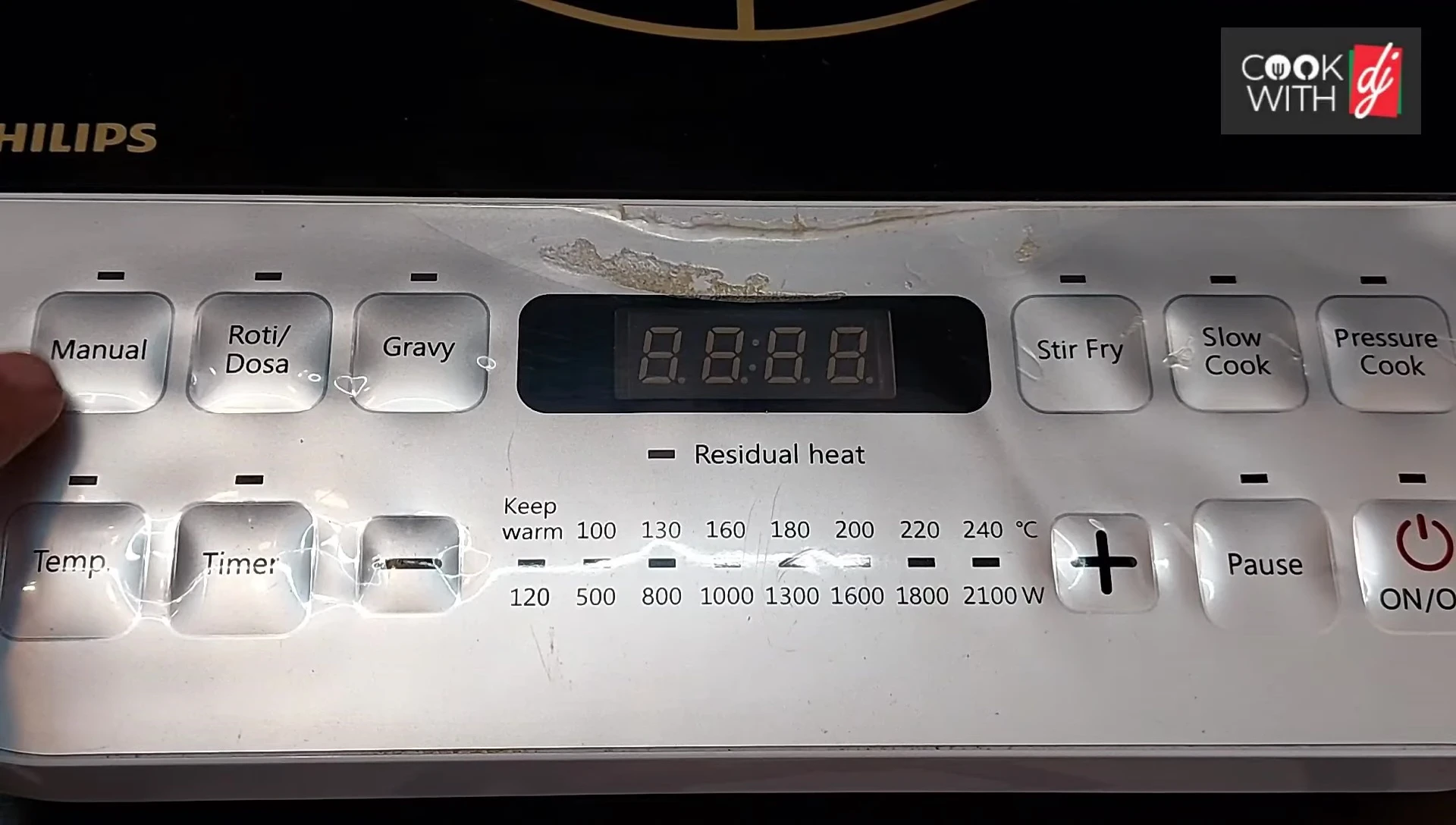 Close-up showing the manual mode selection button