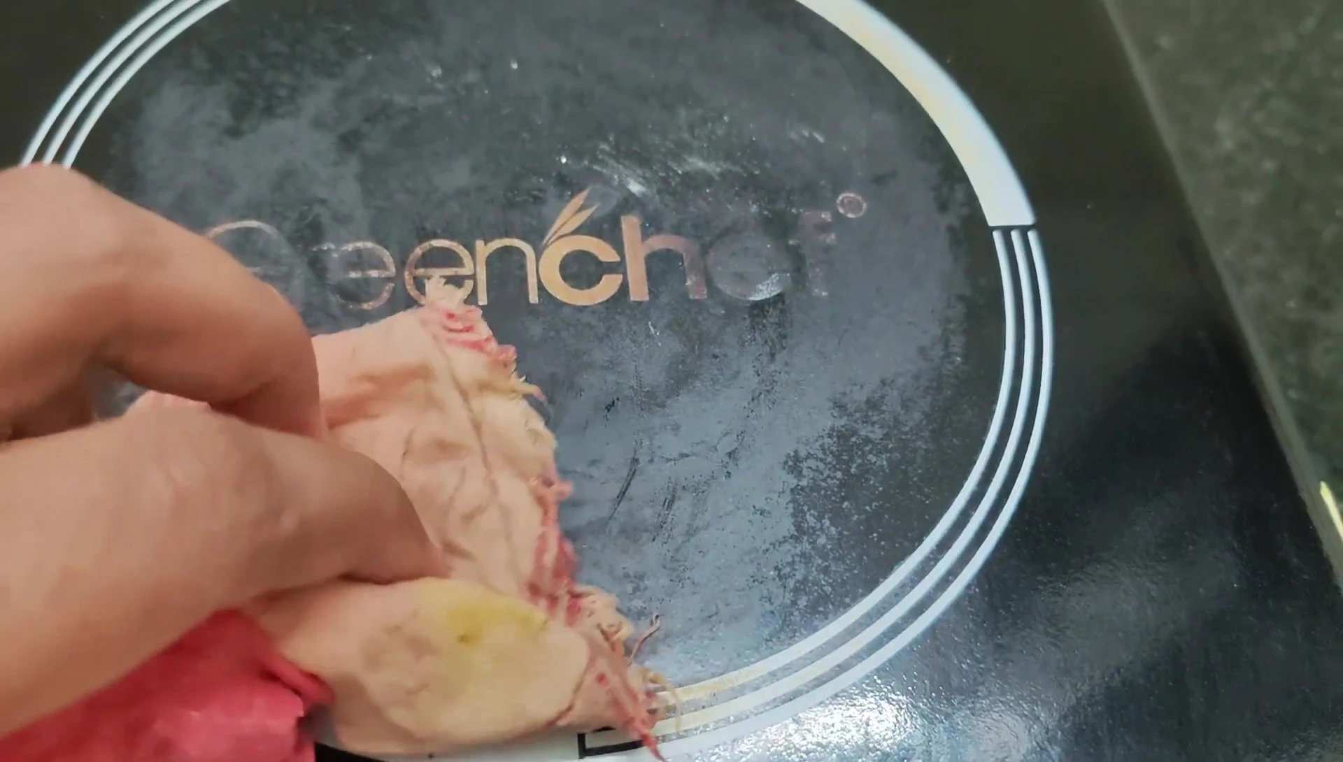 Close-up showing the cooktop's clean and glossy surface.